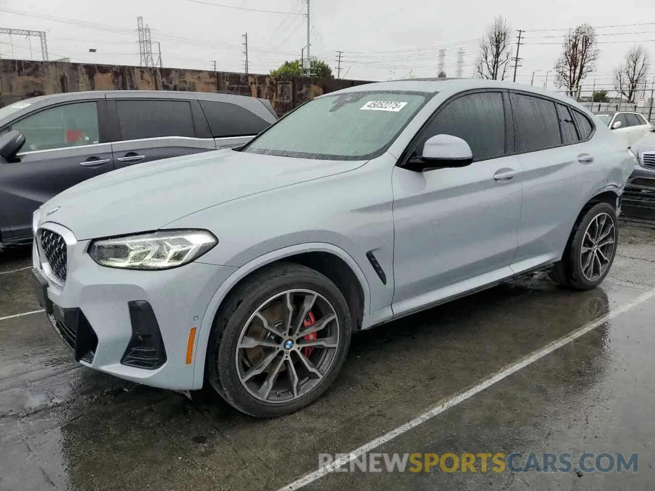 1 Photograph of a damaged car 5UX33DT01N9K75935 BMW X4 2022