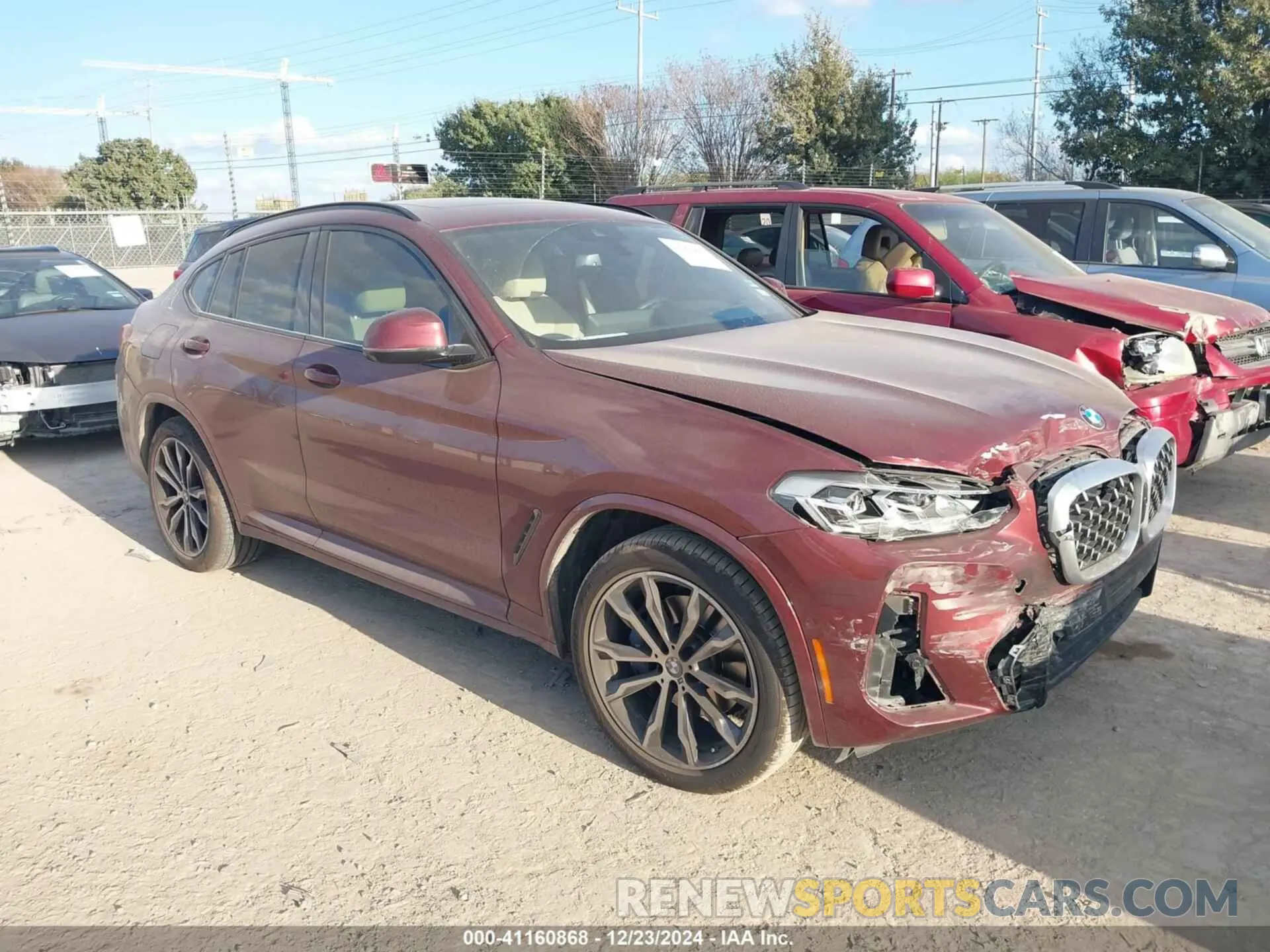 1 Photograph of a damaged car 5UX33DT02N9K32561 BMW X4 2022
