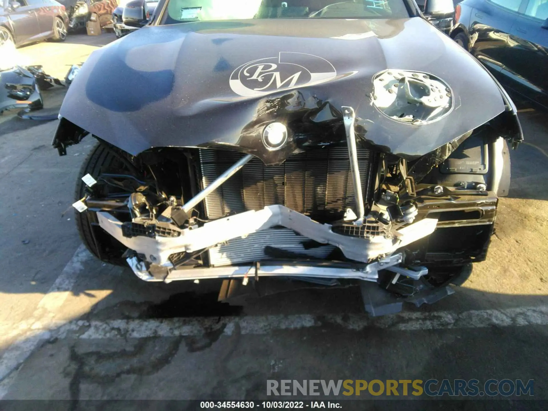 6 Photograph of a damaged car 5UX33DT03N9K34108 BMW X4 2022
