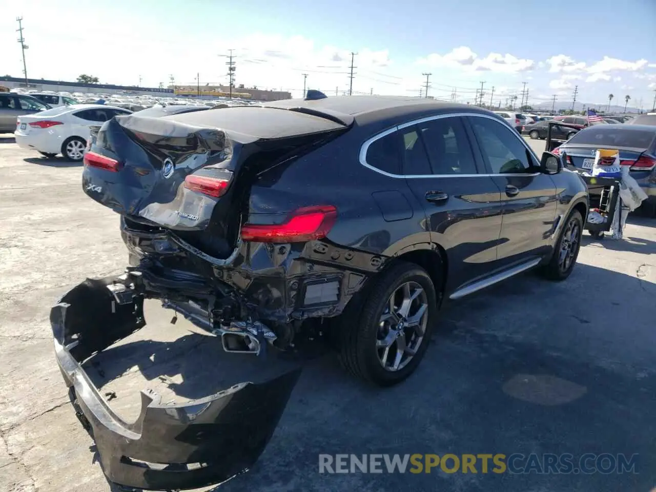 4 Photograph of a damaged car 5UX33DT03N9M34342 BMW X4 2022