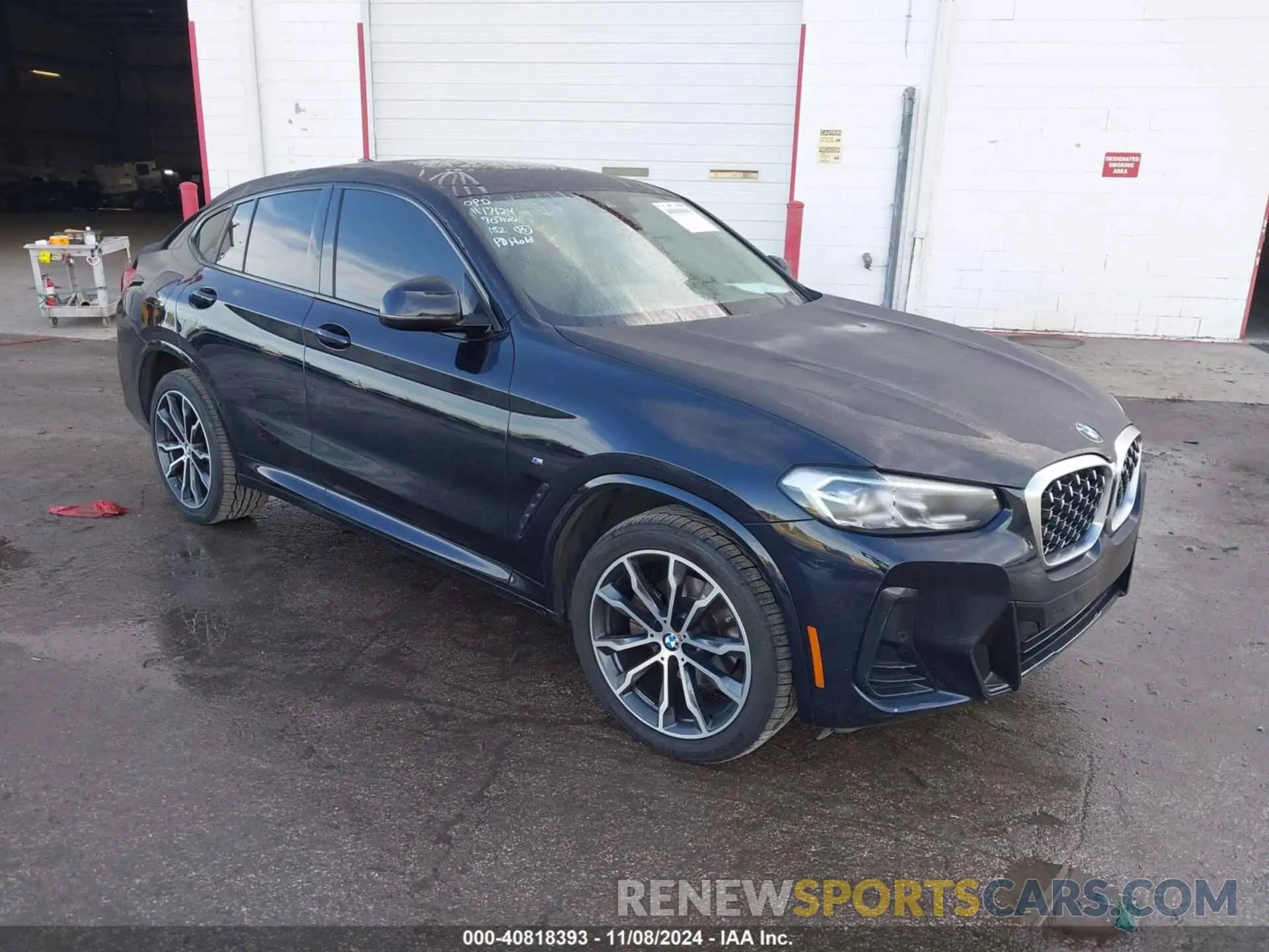 1 Photograph of a damaged car 5UX33DT05N9L32282 BMW X4 2022