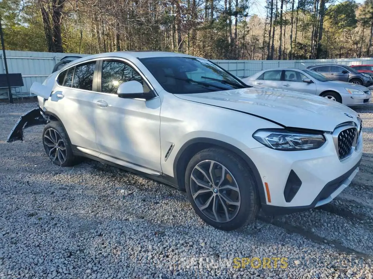 4 Photograph of a damaged car 5UX33DT06N9K82587 BMW X4 2022