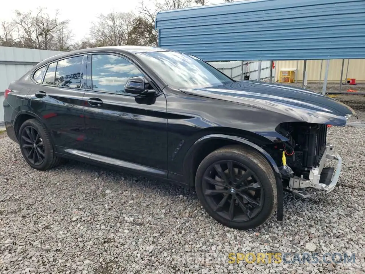 4 Photograph of a damaged car 5UX33DT08N9J98304 BMW X4 2022