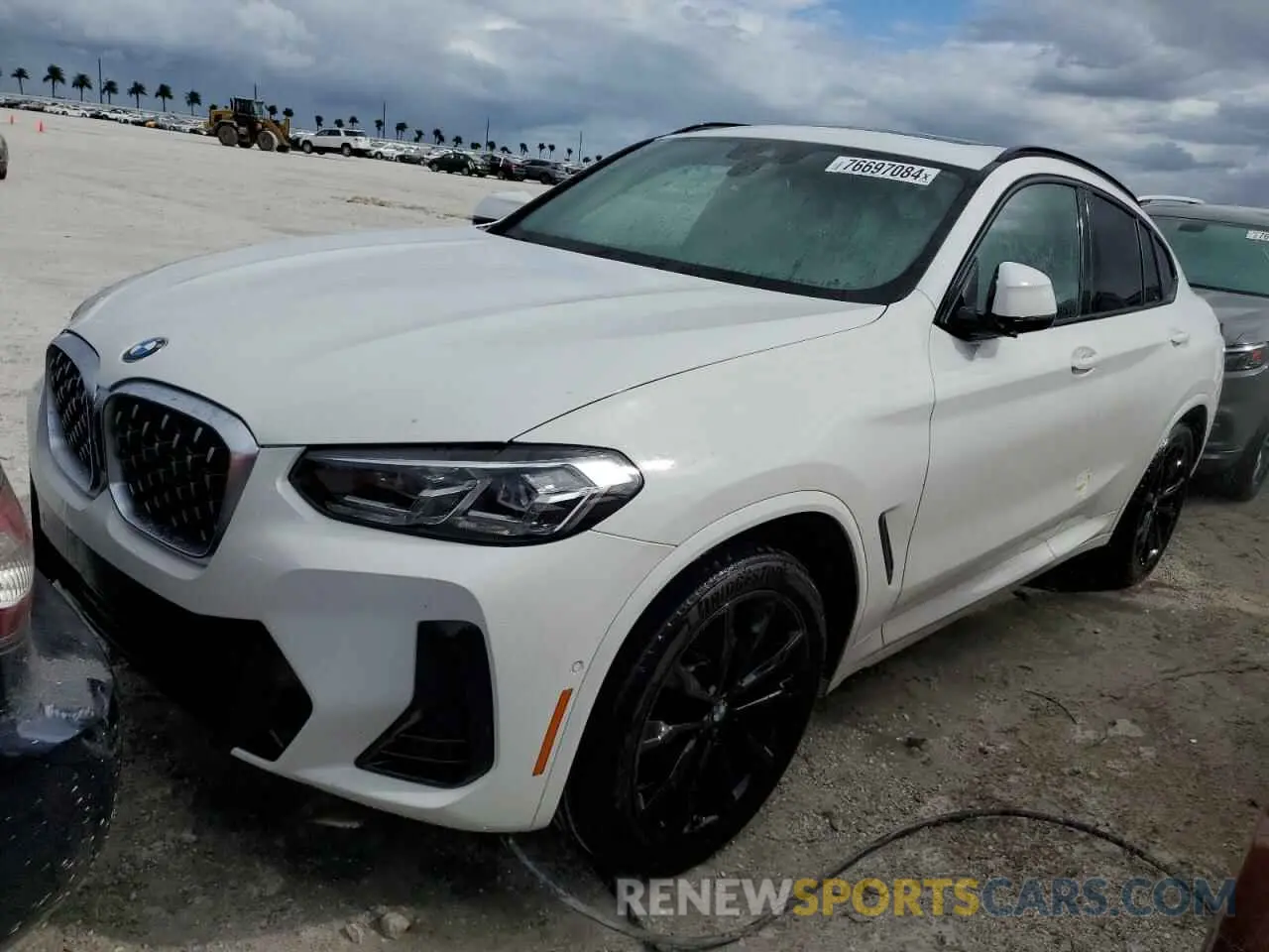 1 Photograph of a damaged car 5UX33DT08N9K73406 BMW X4 2022