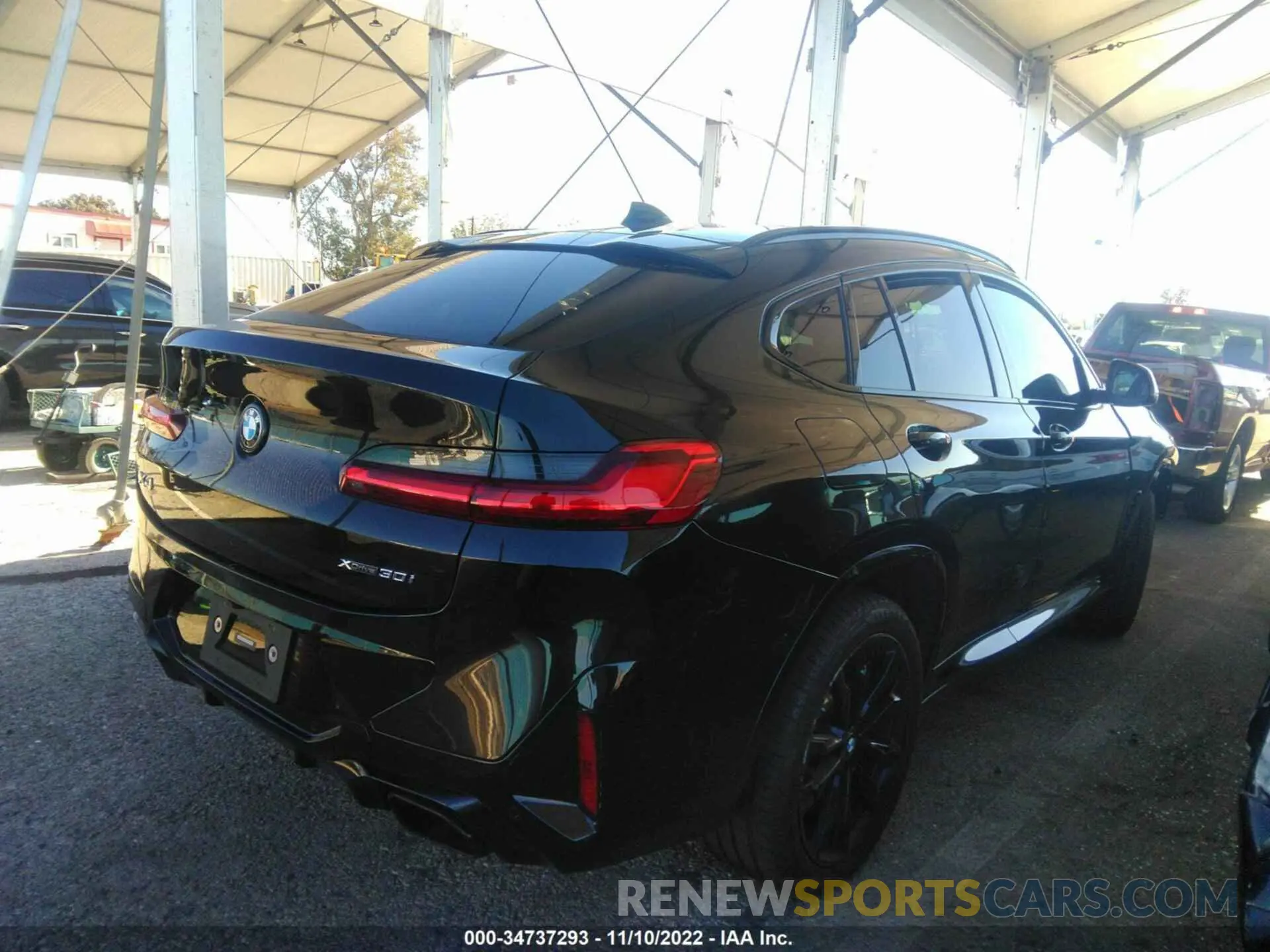 4 Photograph of a damaged car 5UX33DT09N9J01594 BMW X4 2022