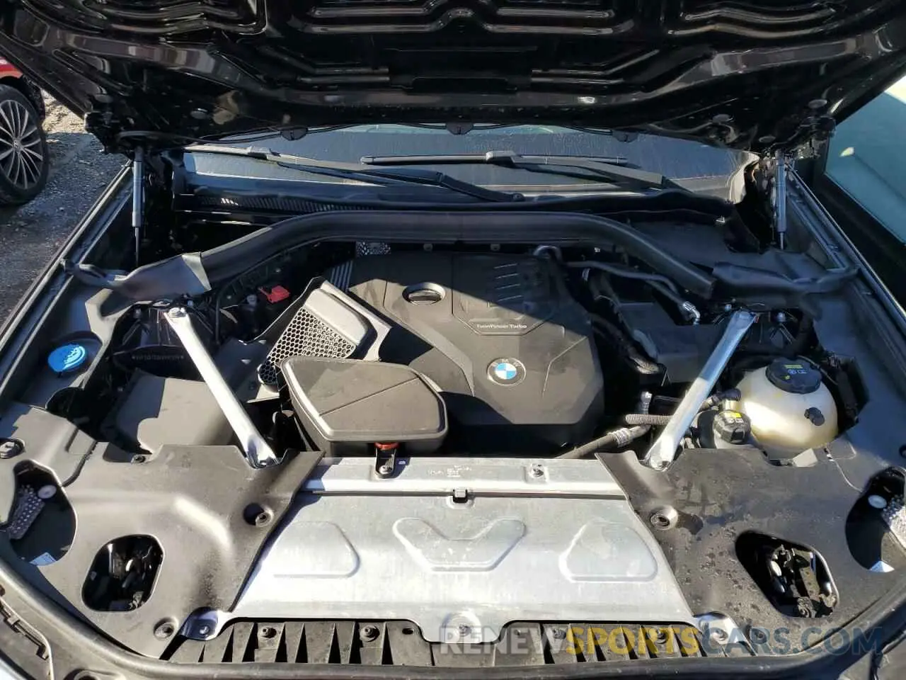 11 Photograph of a damaged car 5UX33DT09N9M87076 BMW X4 2022