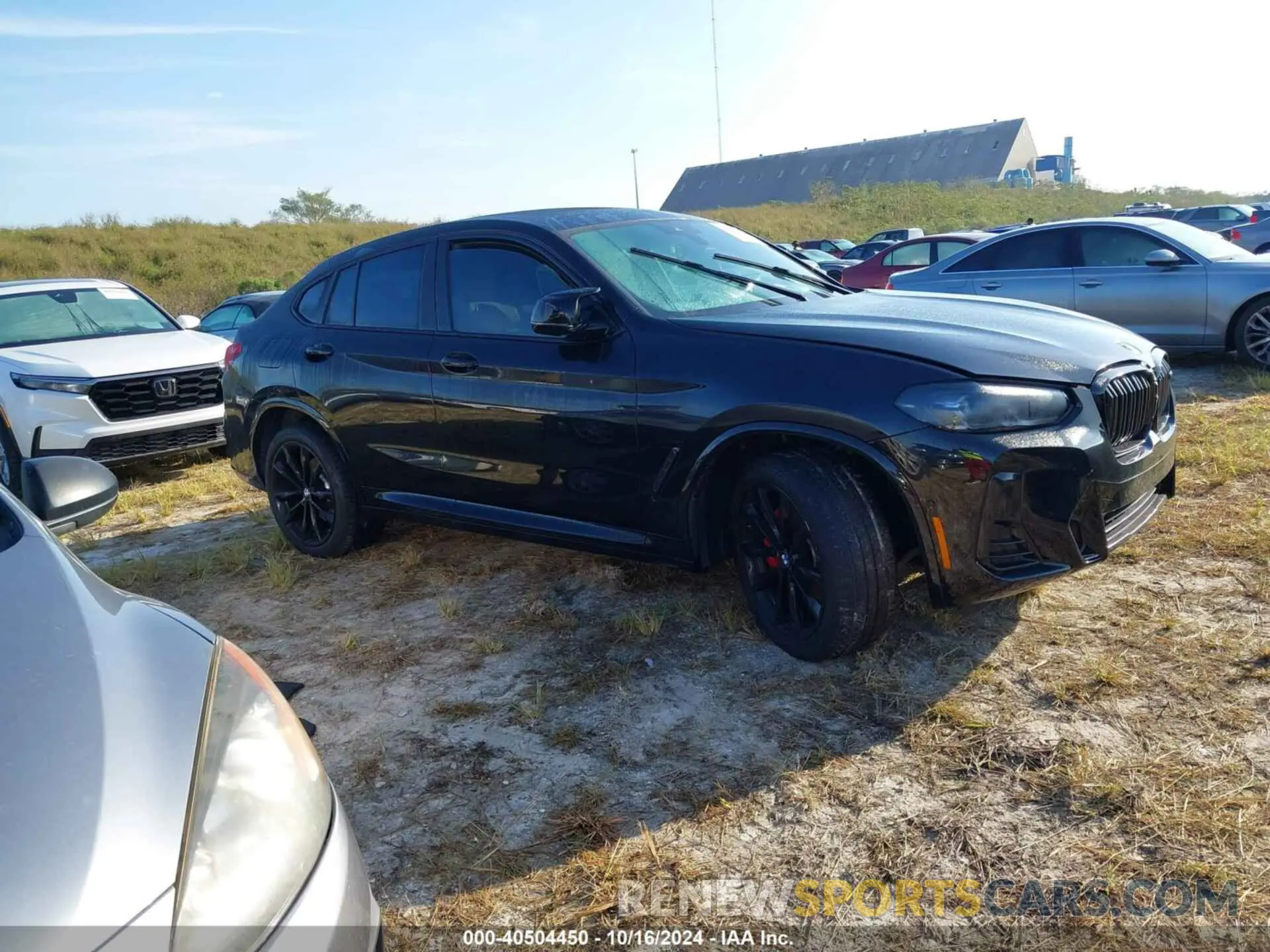 1 Photograph of a damaged car 5UX43DT07N9K41549 BMW X4 2022