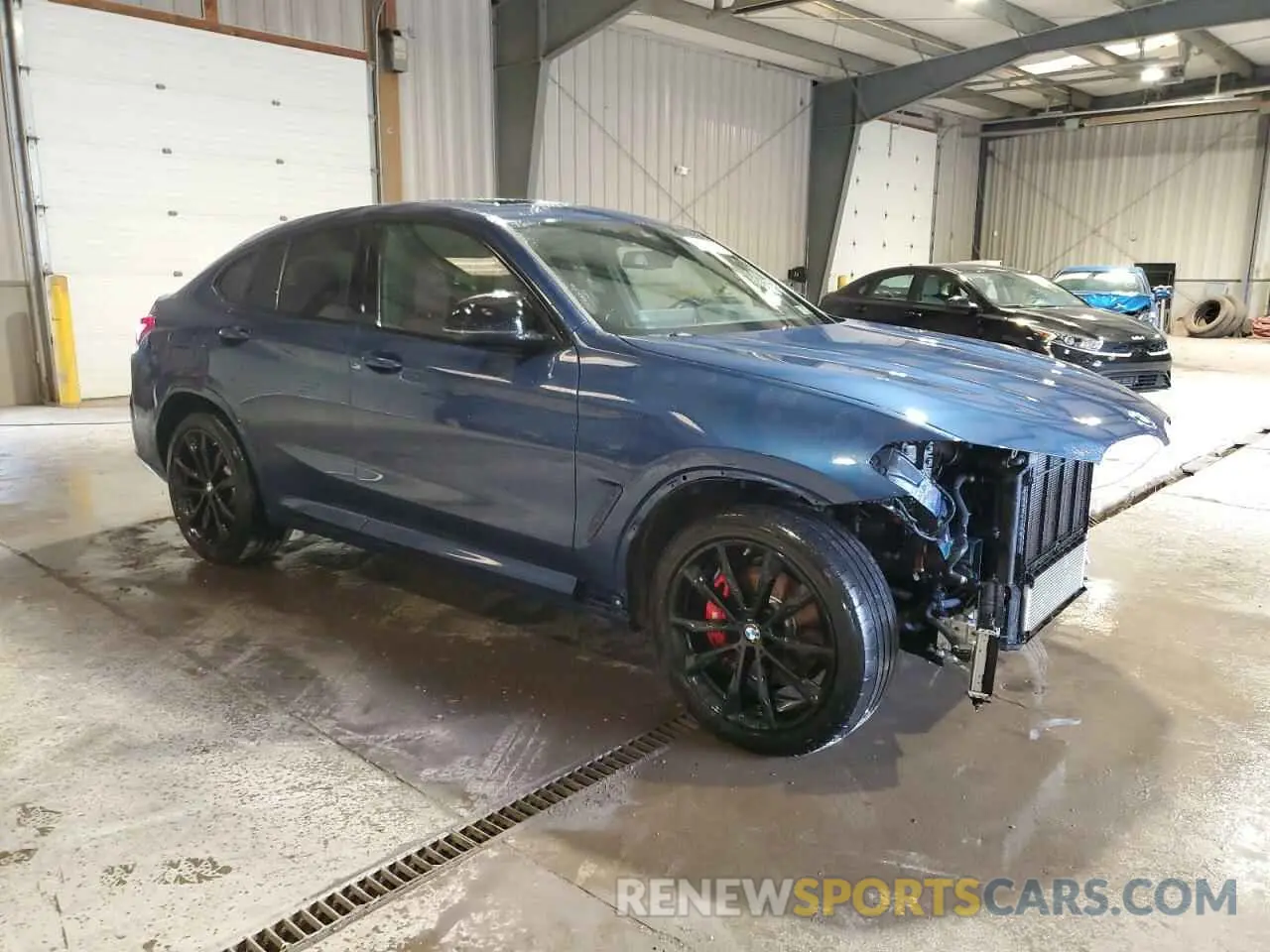 4 Photograph of a damaged car 5UX43DT0XN9K62900 BMW X4 2022