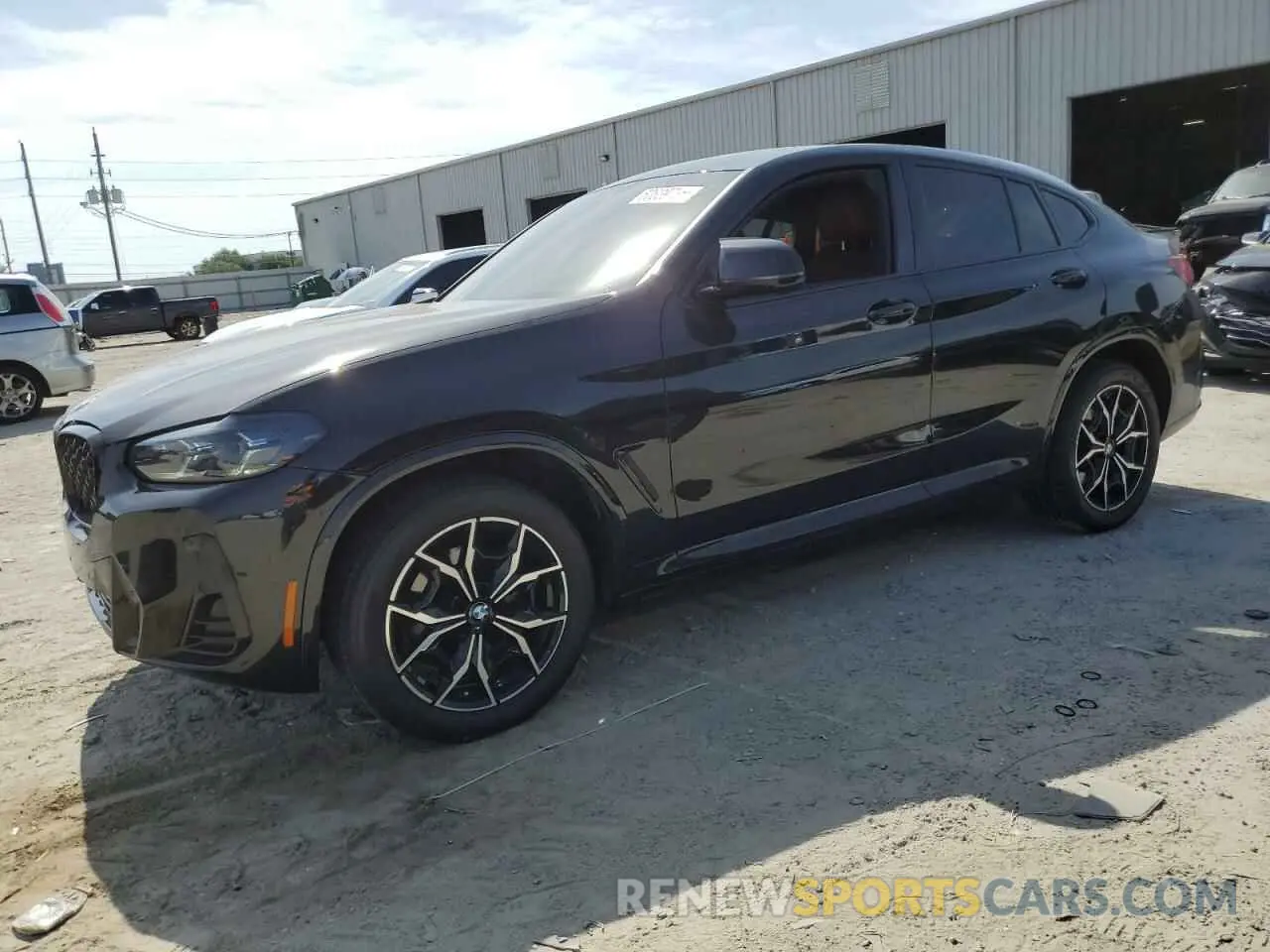 1 Photograph of a damaged car 5UX33DT01P9N72142 BMW X4 2023