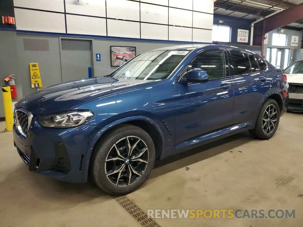 1 Photograph of a damaged car 5UX33DT08P9P12848 BMW X4 2023