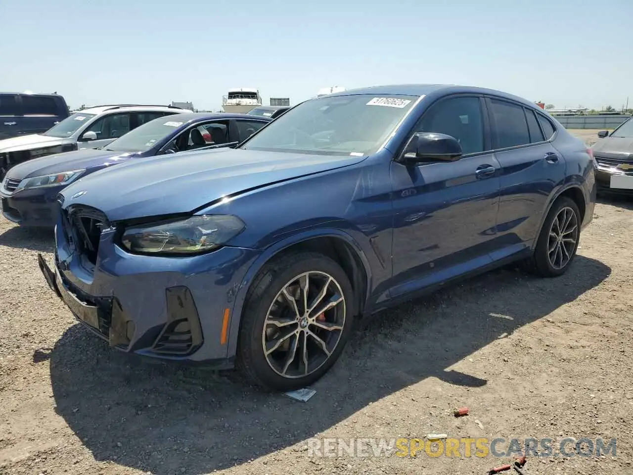 1 Photograph of a damaged car 5UX43DT00P9P32175 BMW X4 2023