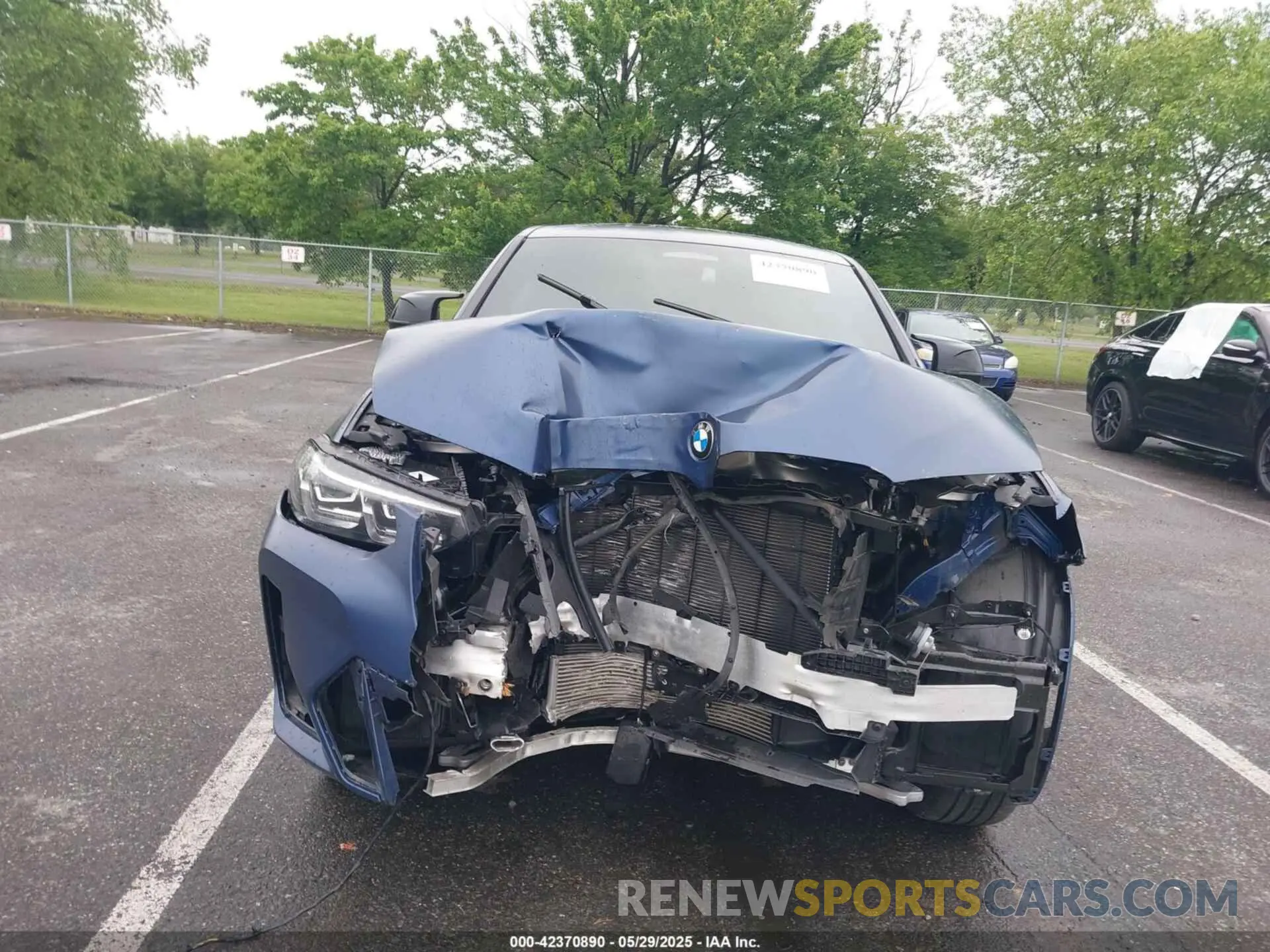 13 Photograph of a damaged car 5UX43DT04P9P31854 BMW X4 2023