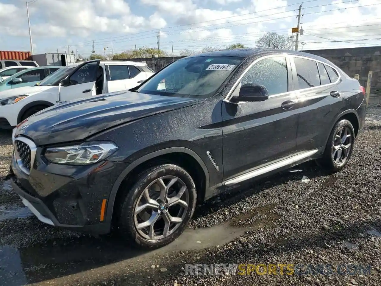 1 Photograph of a damaged car 5UX33DT00R9V06216 BMW X4 2024