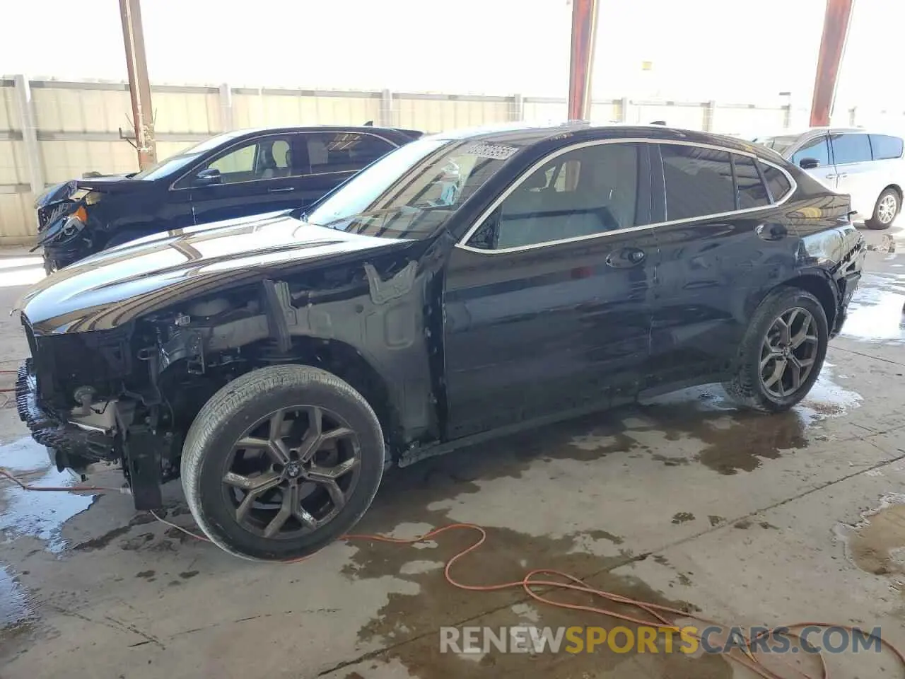 1 Photograph of a damaged car 5UX33DT07R9V05824 BMW X4 2024