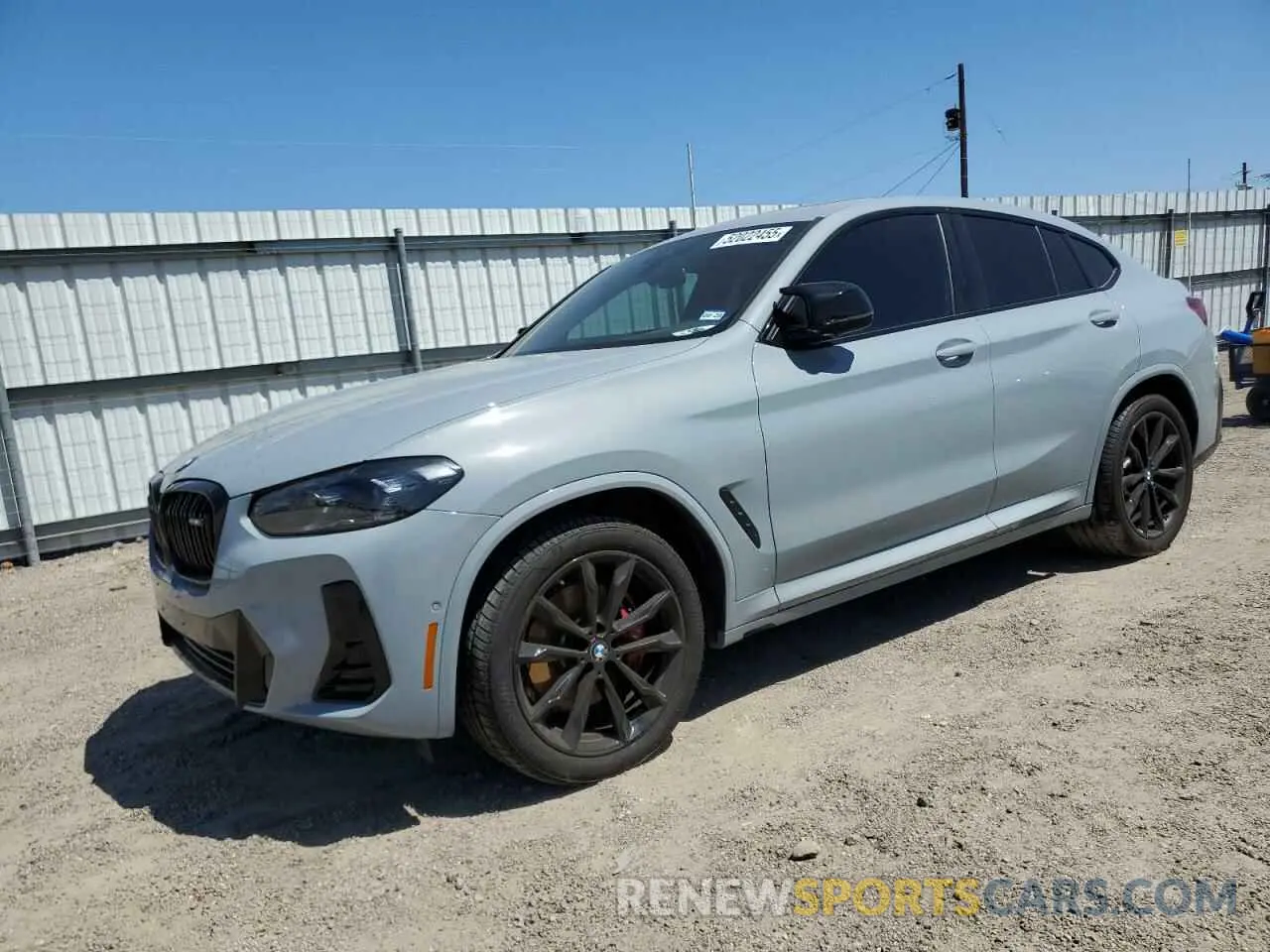 1 Photograph of a damaged car 5UX43DT00R9X03584 BMW X4 2024