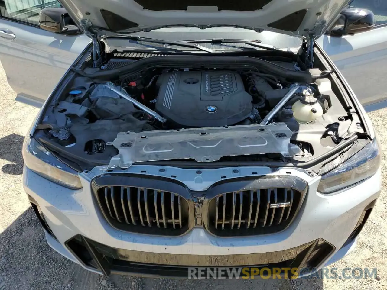 12 Photograph of a damaged car 5UX43DT00R9X03584 BMW X4 2024