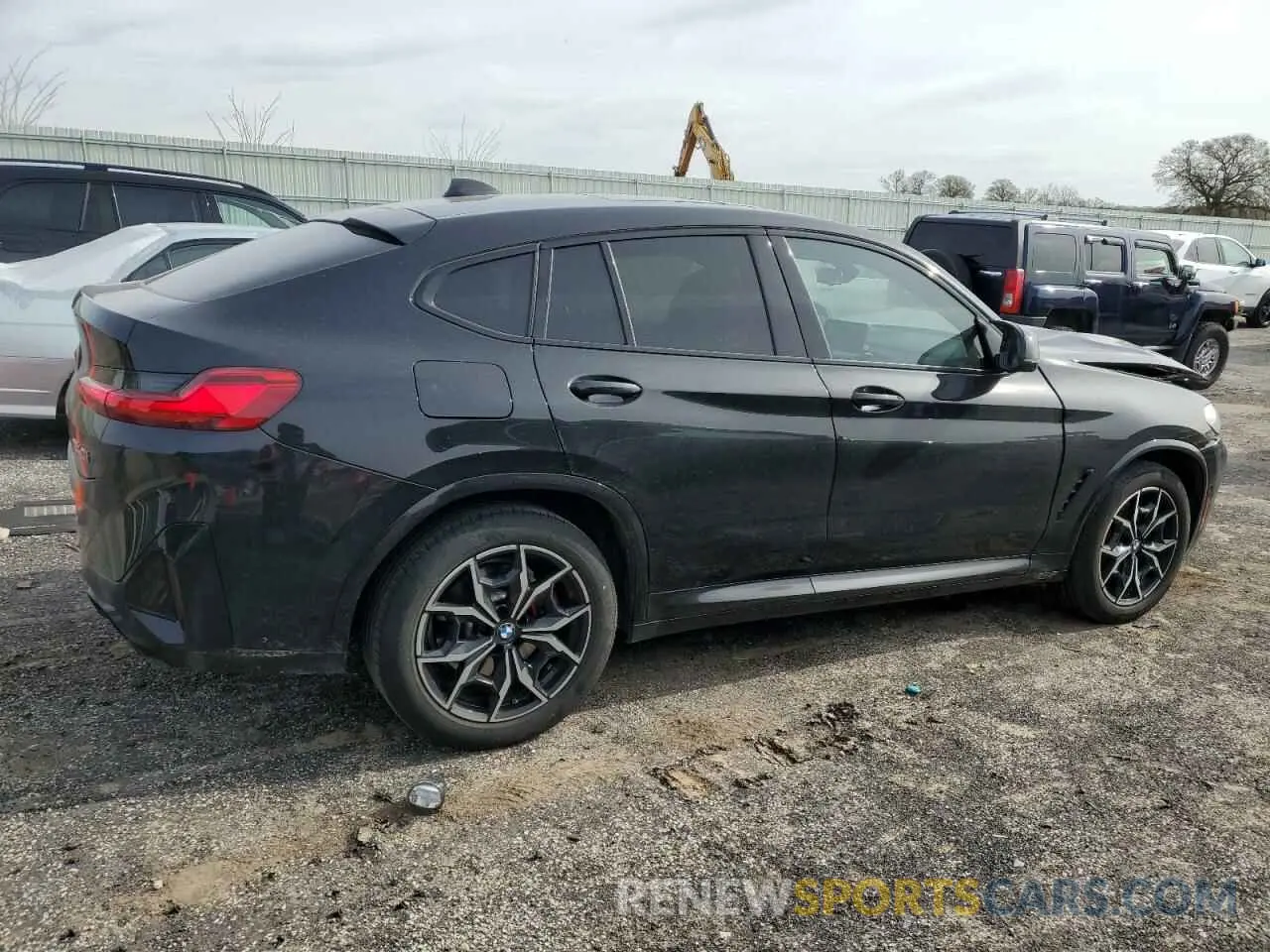 3 Photograph of a damaged car 5UX43DT05R9U46776 BMW X4 2024