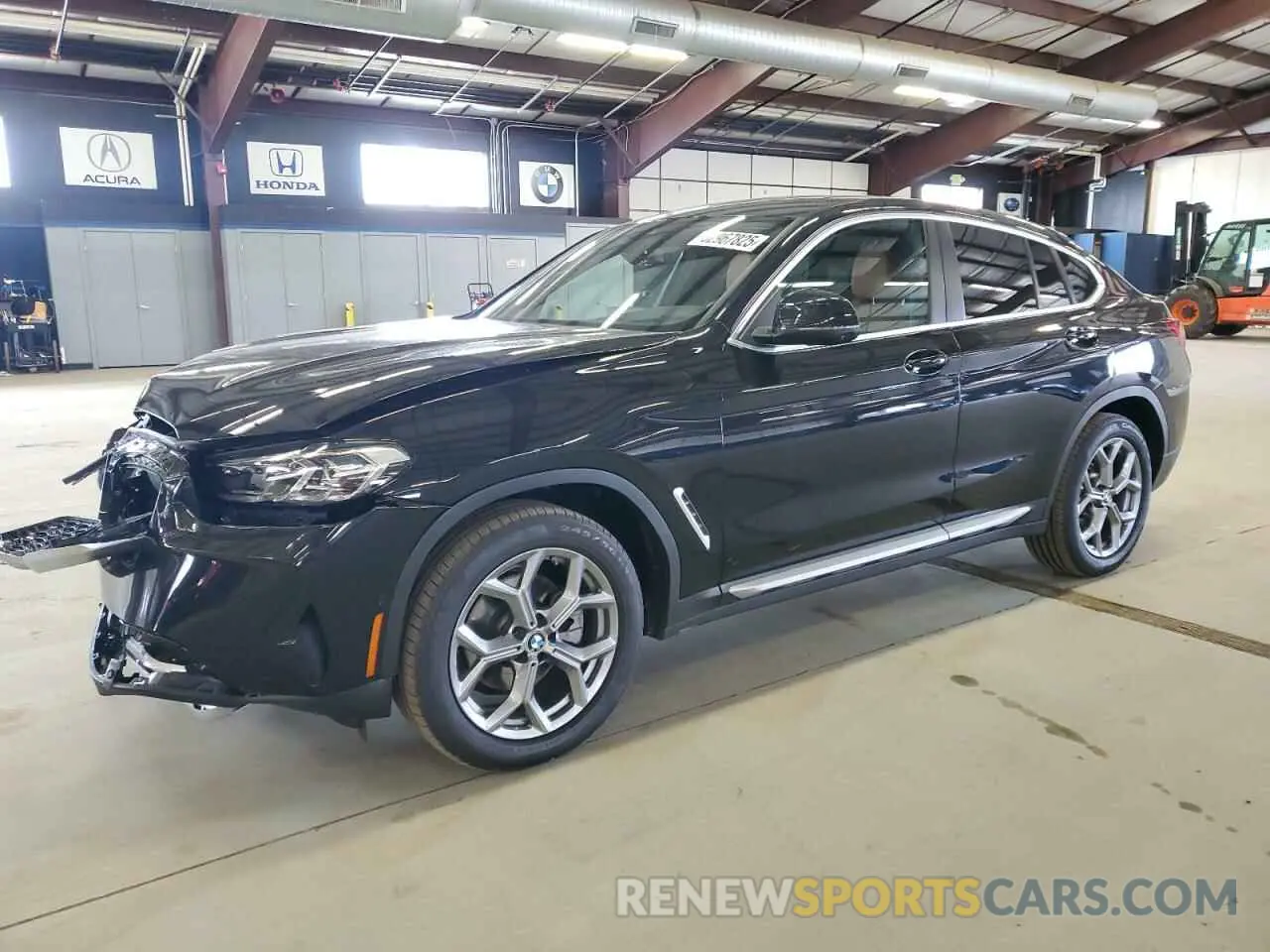 1 Photograph of a damaged car 5UX33DT06S9X61782 BMW X4 2025