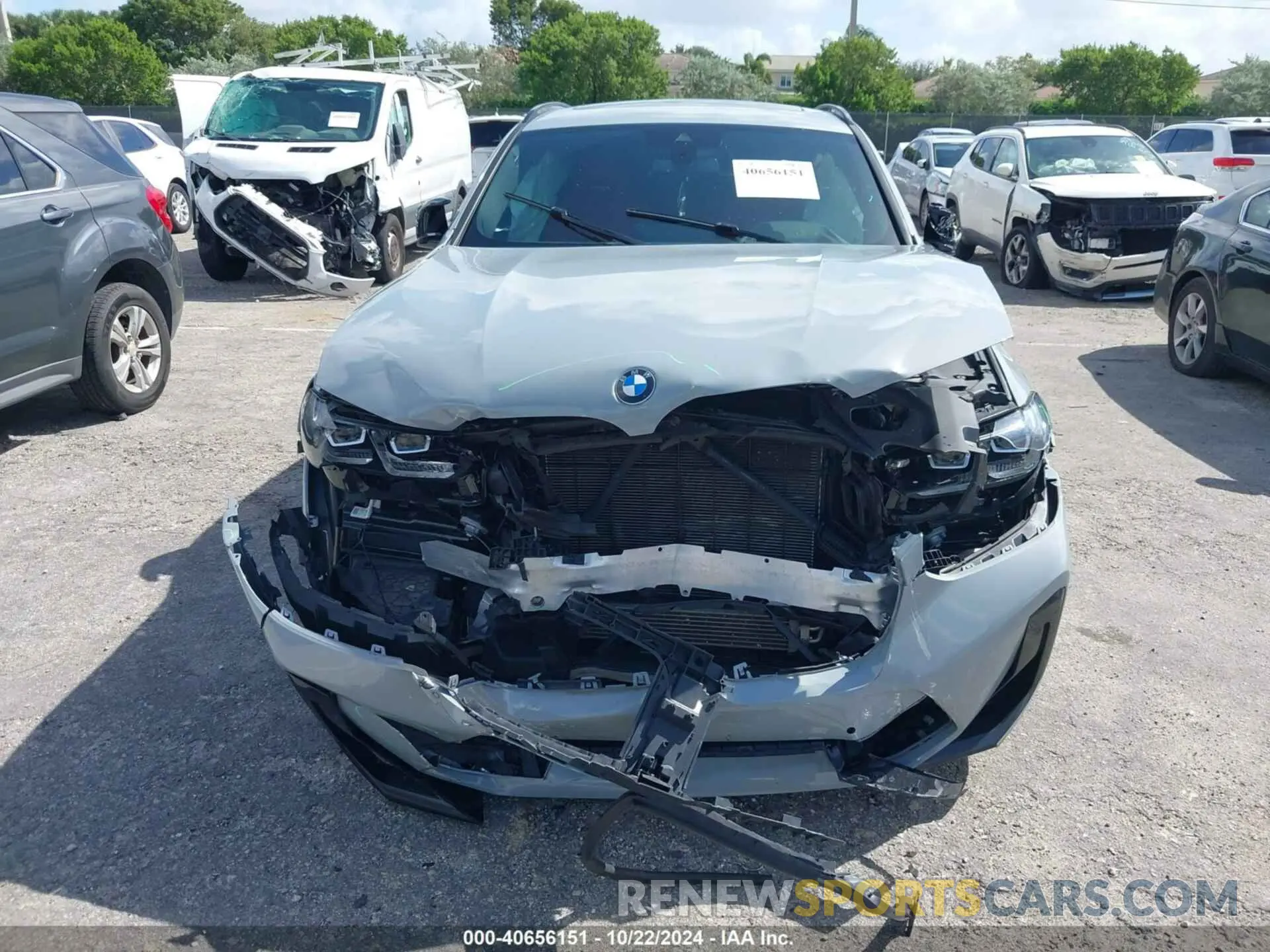 6 Photograph of a damaged car 5YM23EC02N9L63144 BMW X4 M 2022