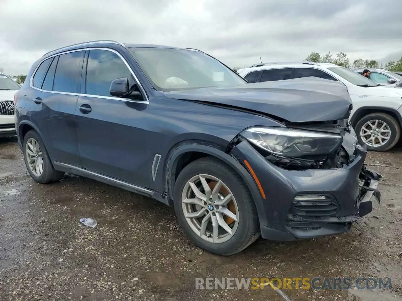 4 Photograph of a damaged car 5UXCR4C09L9C69069 BMW X5 2020
