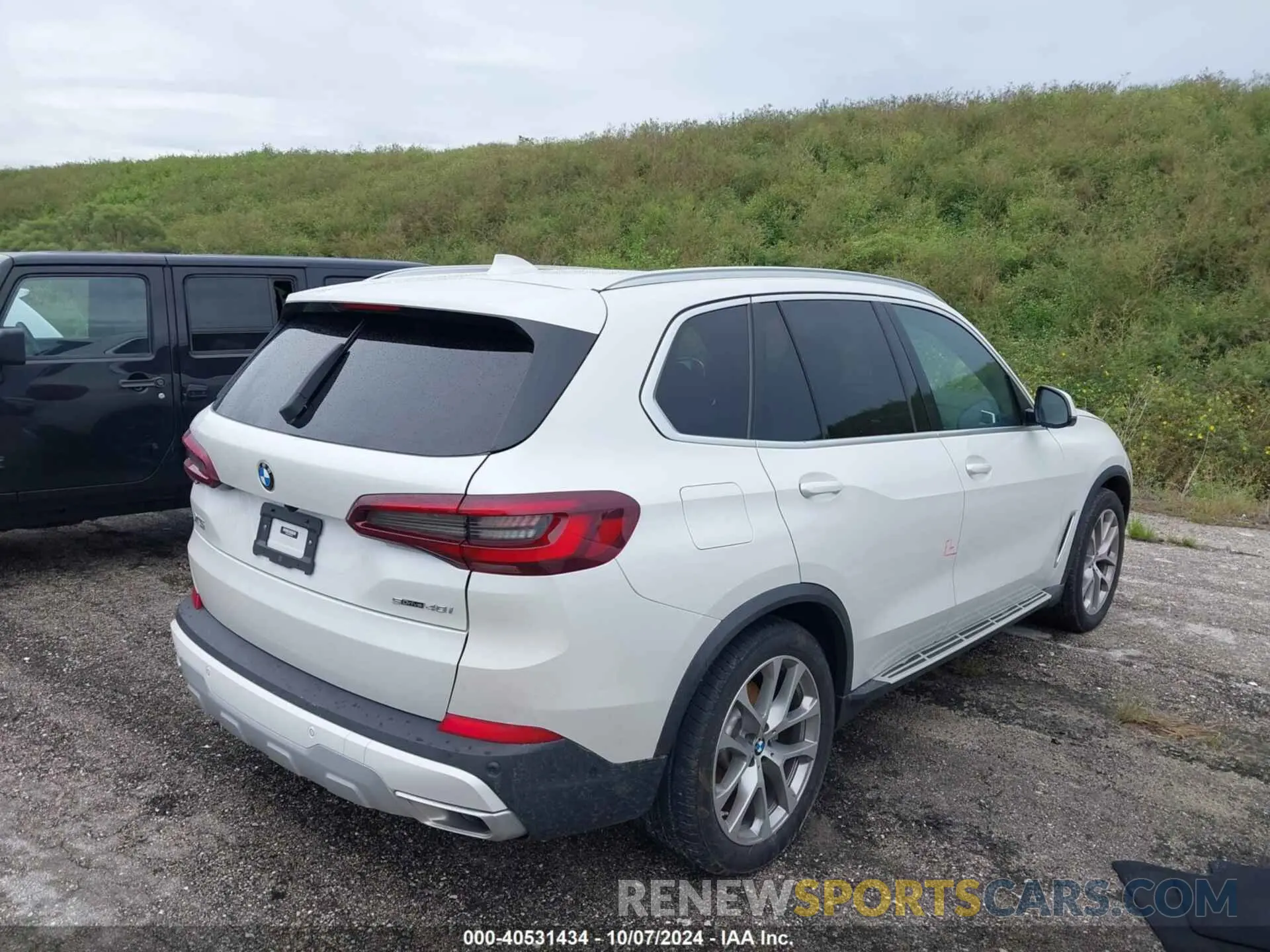 4 Photograph of a damaged car 5UXCR4C03P9P50728 BMW X5 2023