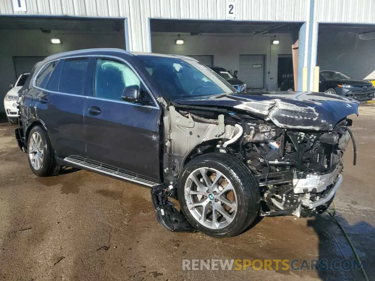 4 Photograph of a damaged car 5UXCR4C06P9P92133 BMW X5 2023