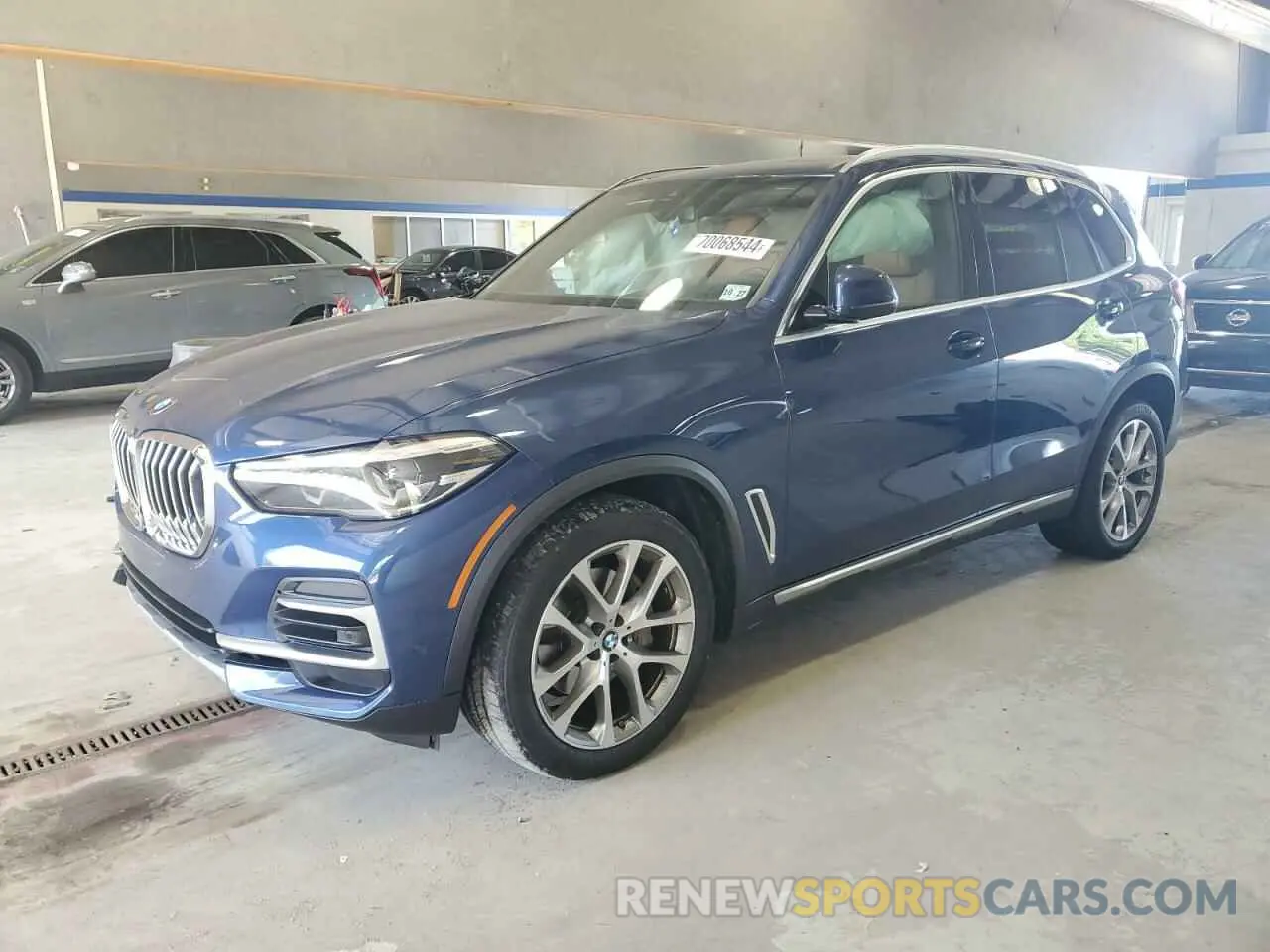1 Photograph of a damaged car 5UXCR6C01P9N68490 BMW X5 2023