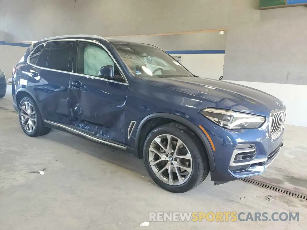4 Photograph of a damaged car 5UXCR6C01P9N68490 BMW X5 2023