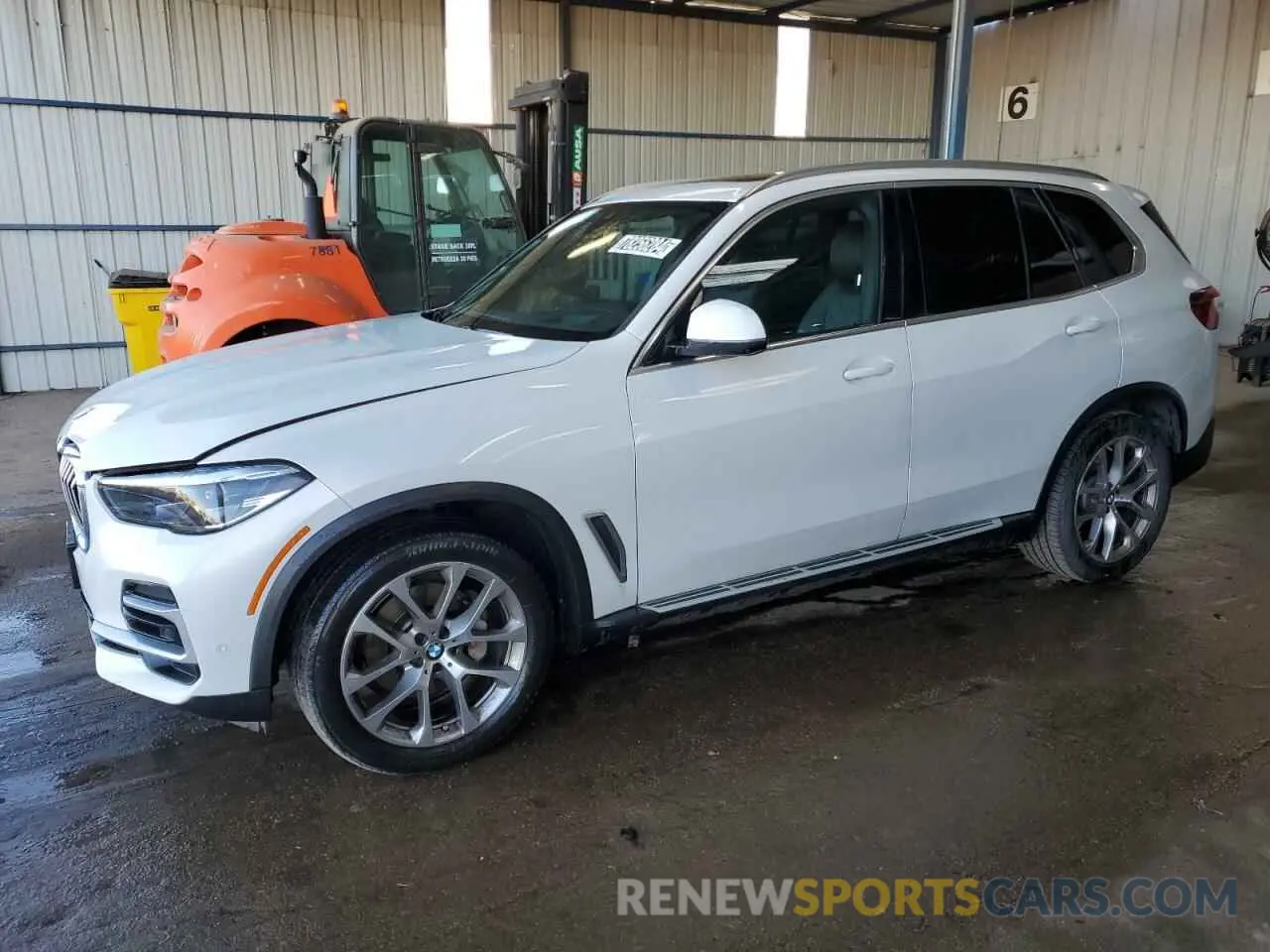 1 Photograph of a damaged car 5UXCR6C01P9P62999 BMW X5 2023