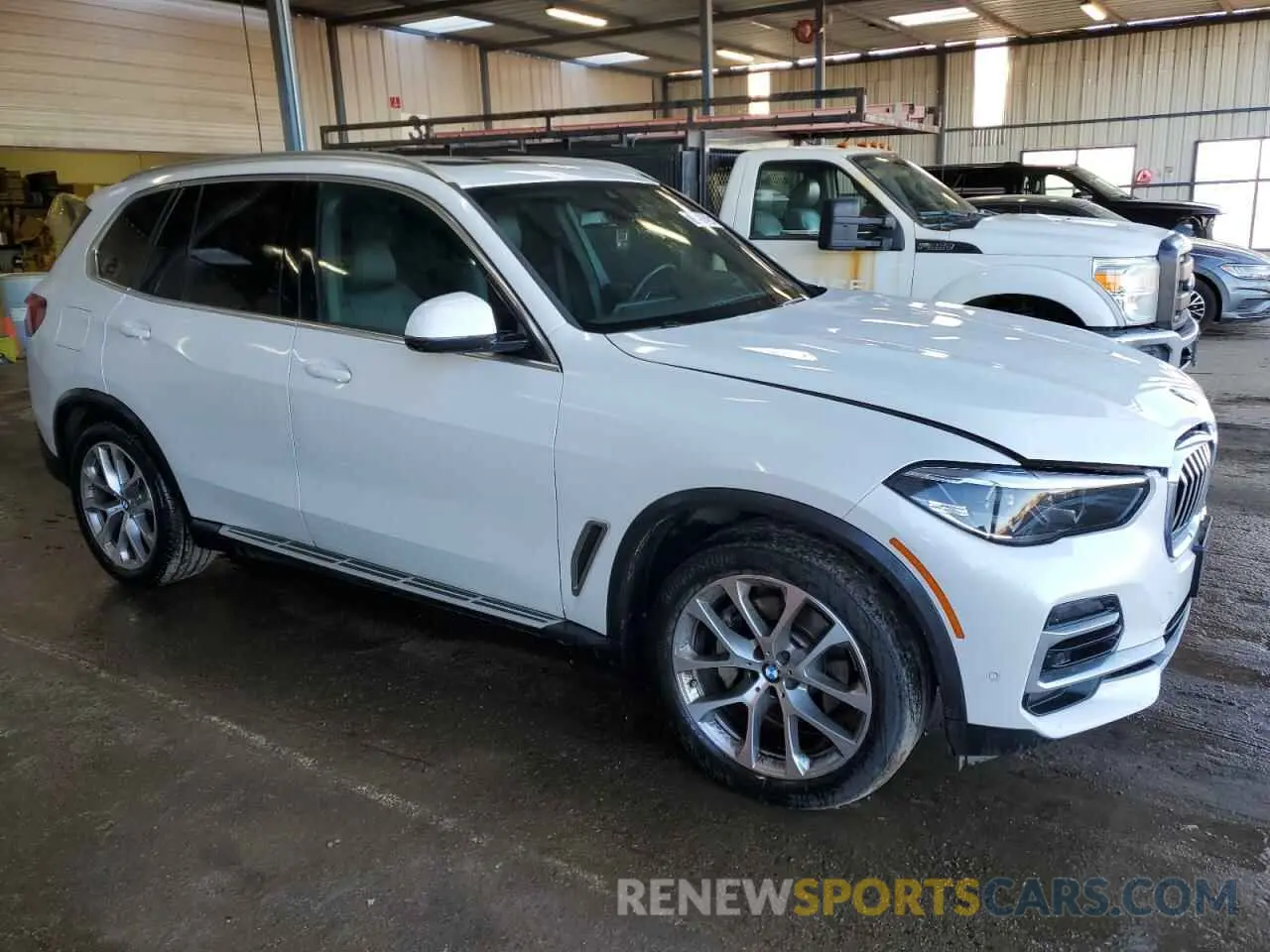 4 Photograph of a damaged car 5UXCR6C01P9P62999 BMW X5 2023