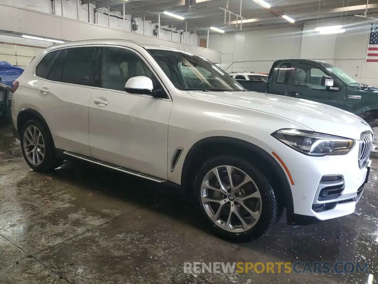 4 Photograph of a damaged car 5UXCR6C03P9P63183 BMW X5 2023