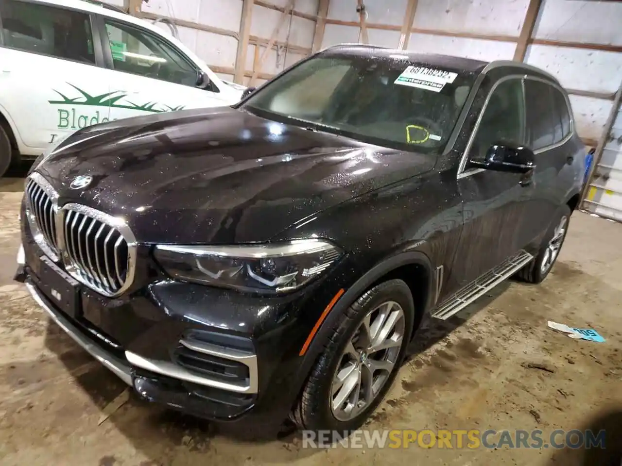 1 Photograph of a damaged car 5UXCR6C04P9P23064 BMW X5 2023