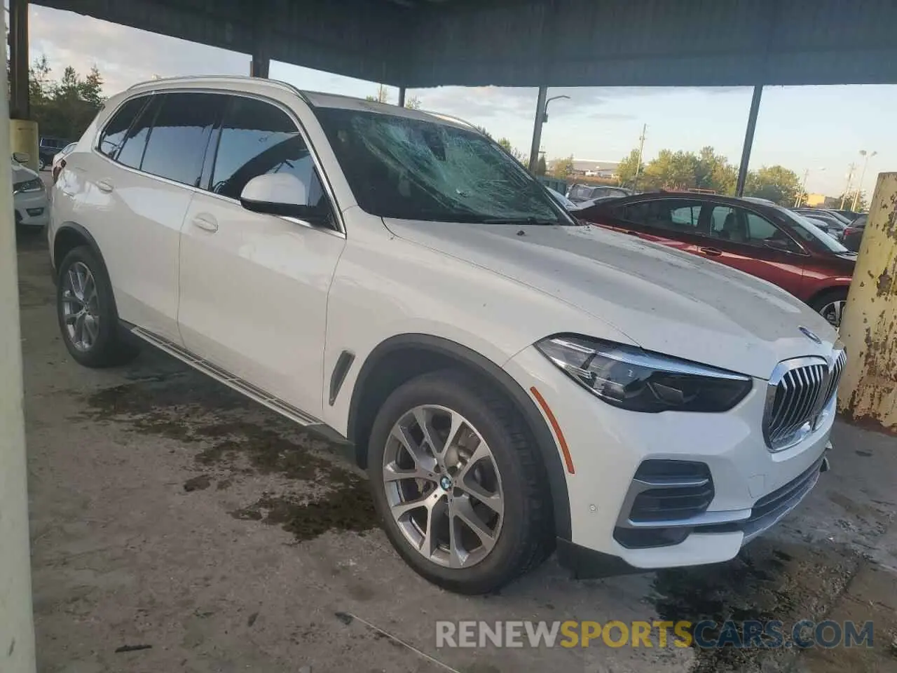 4 Photograph of a damaged car 5UXCR6C04P9P75729 BMW X5 2023