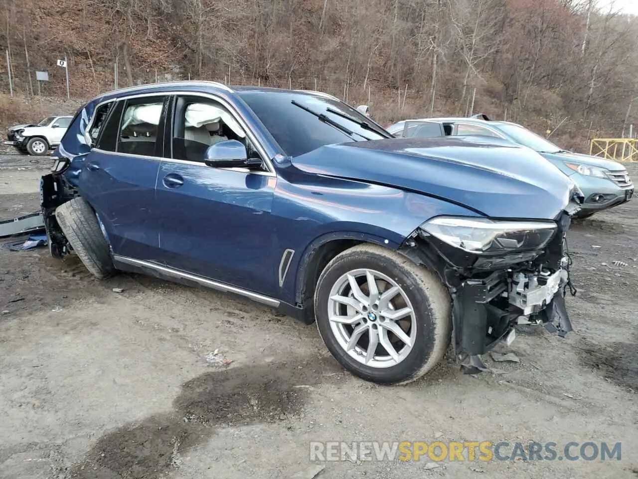 4 Photograph of a damaged car 5UXCR6C0XP9P66310 BMW X5 2023