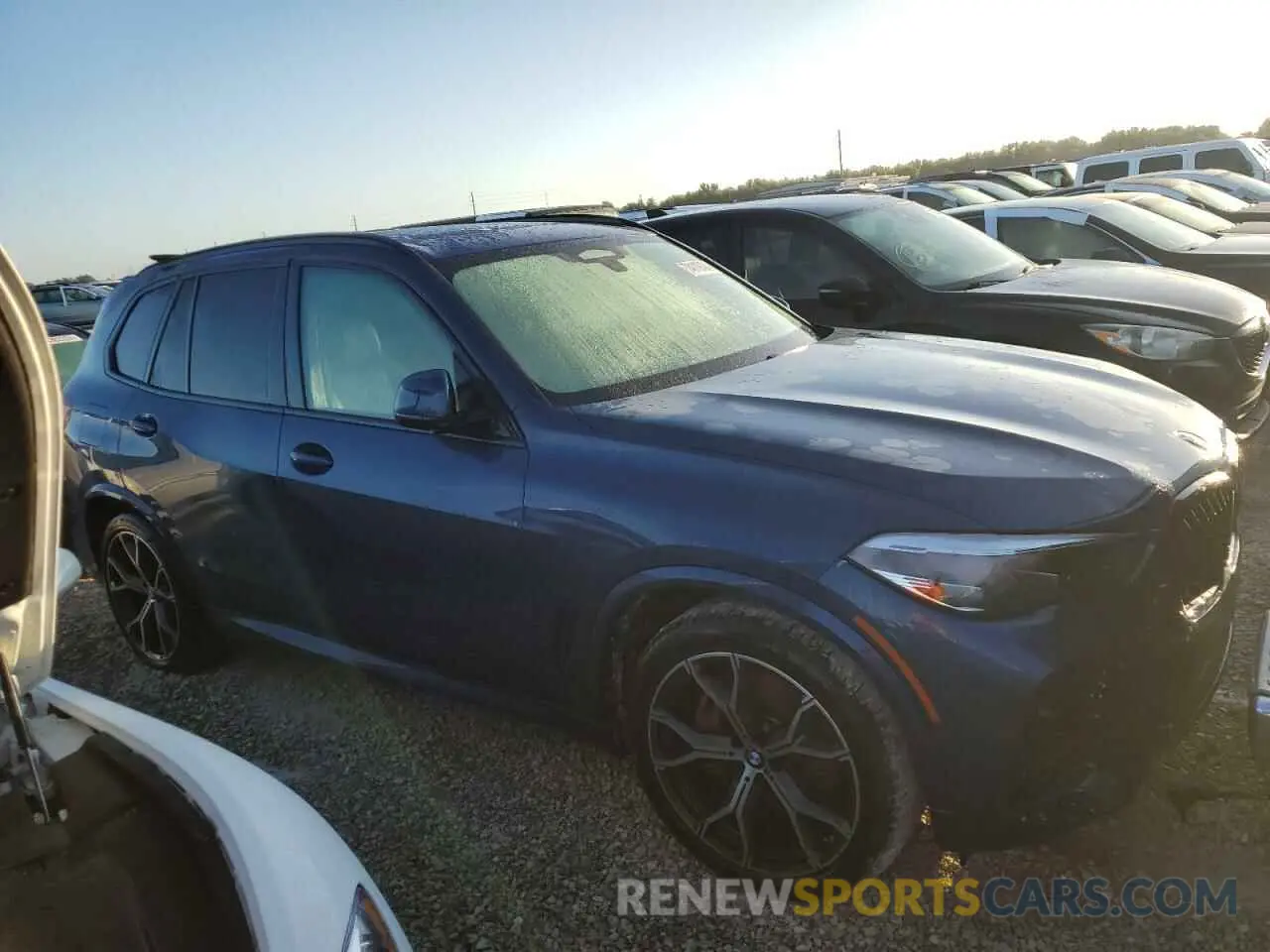 4 Photograph of a damaged car 5UXCR6C0XP9P67442 BMW X5 2023