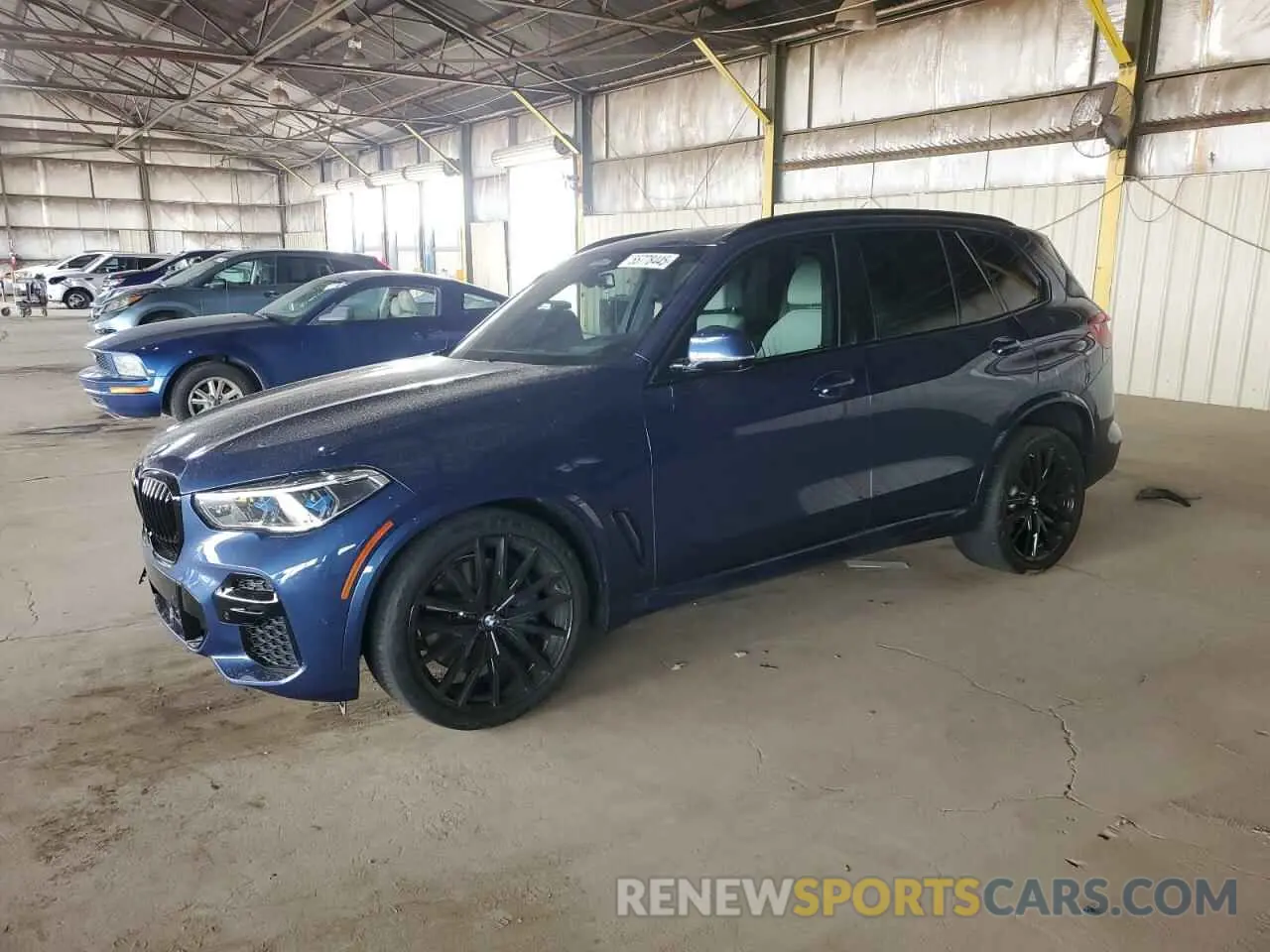 1 Photograph of a damaged car 5UXJU4C09P9P85232 BMW X5 2023