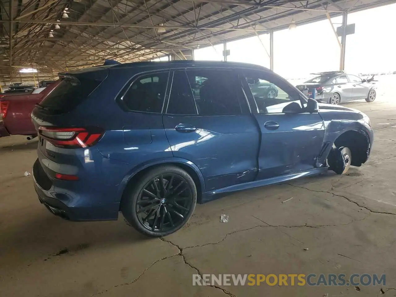 3 Photograph of a damaged car 5UXJU4C09P9P85232 BMW X5 2023