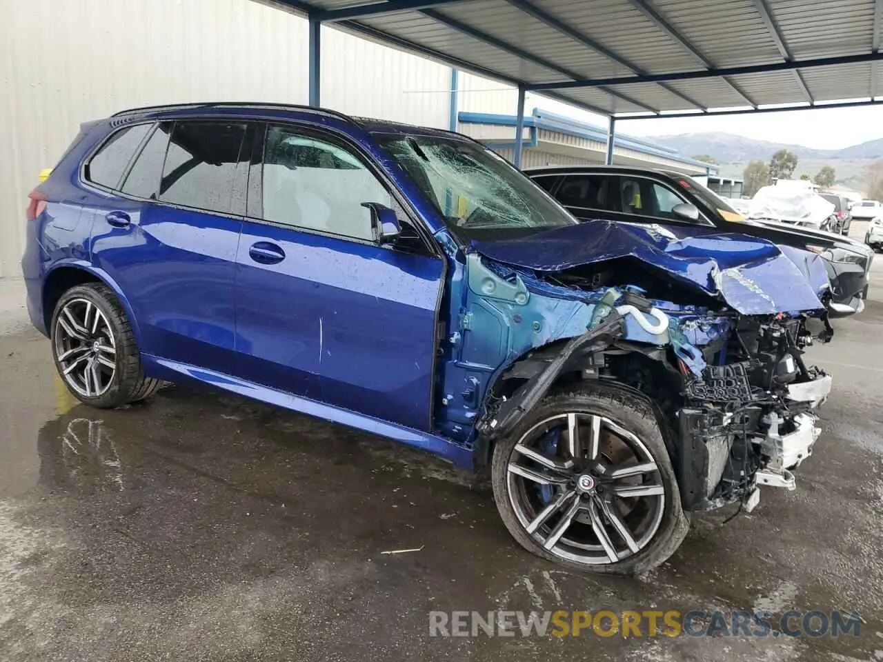4 Photograph of a damaged car 5YMJU0C08P9R37020 BMW X5 2023