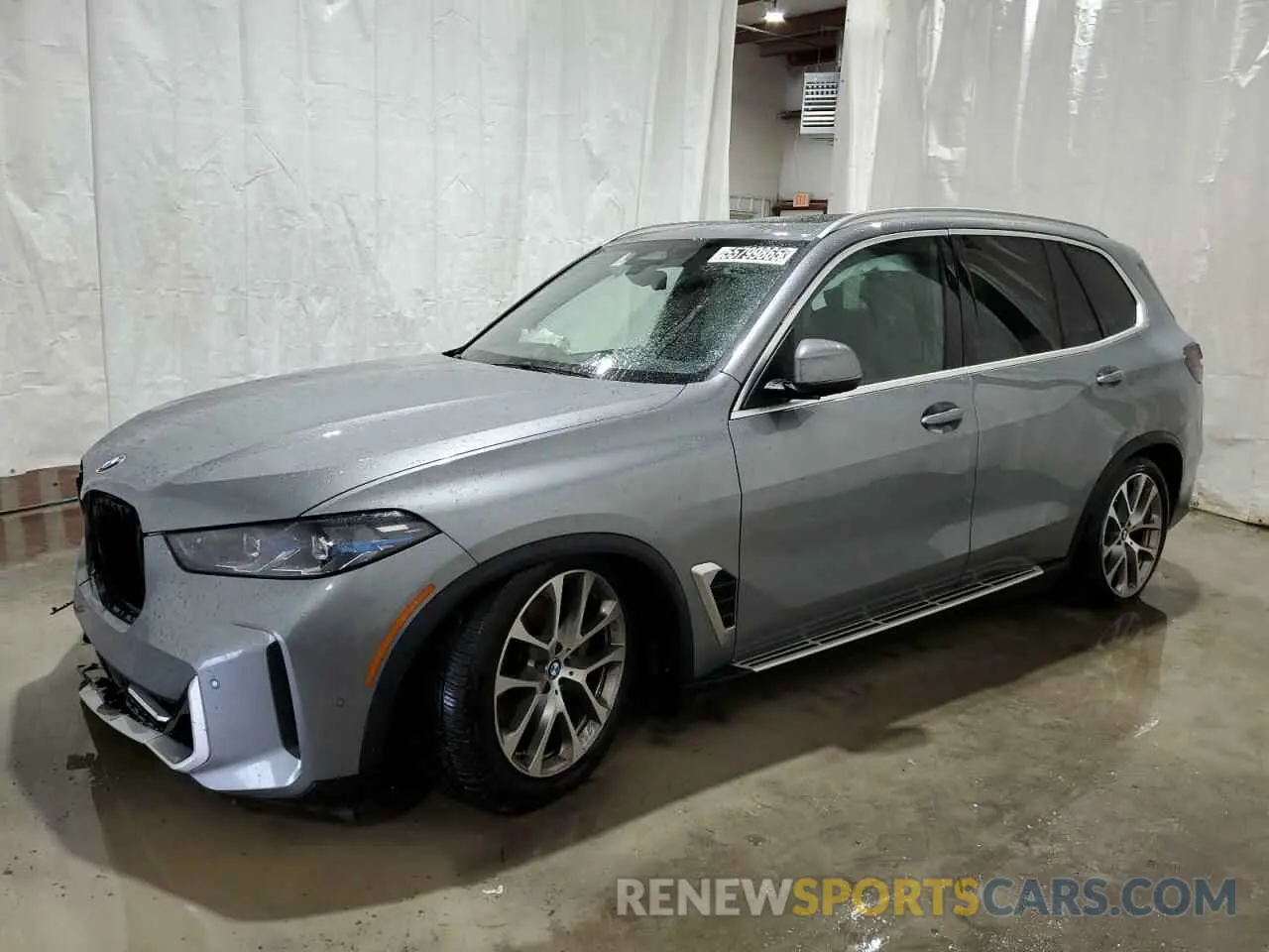 1 Photograph of a damaged car 5UX13EU00R9U94158 BMW X5 2024