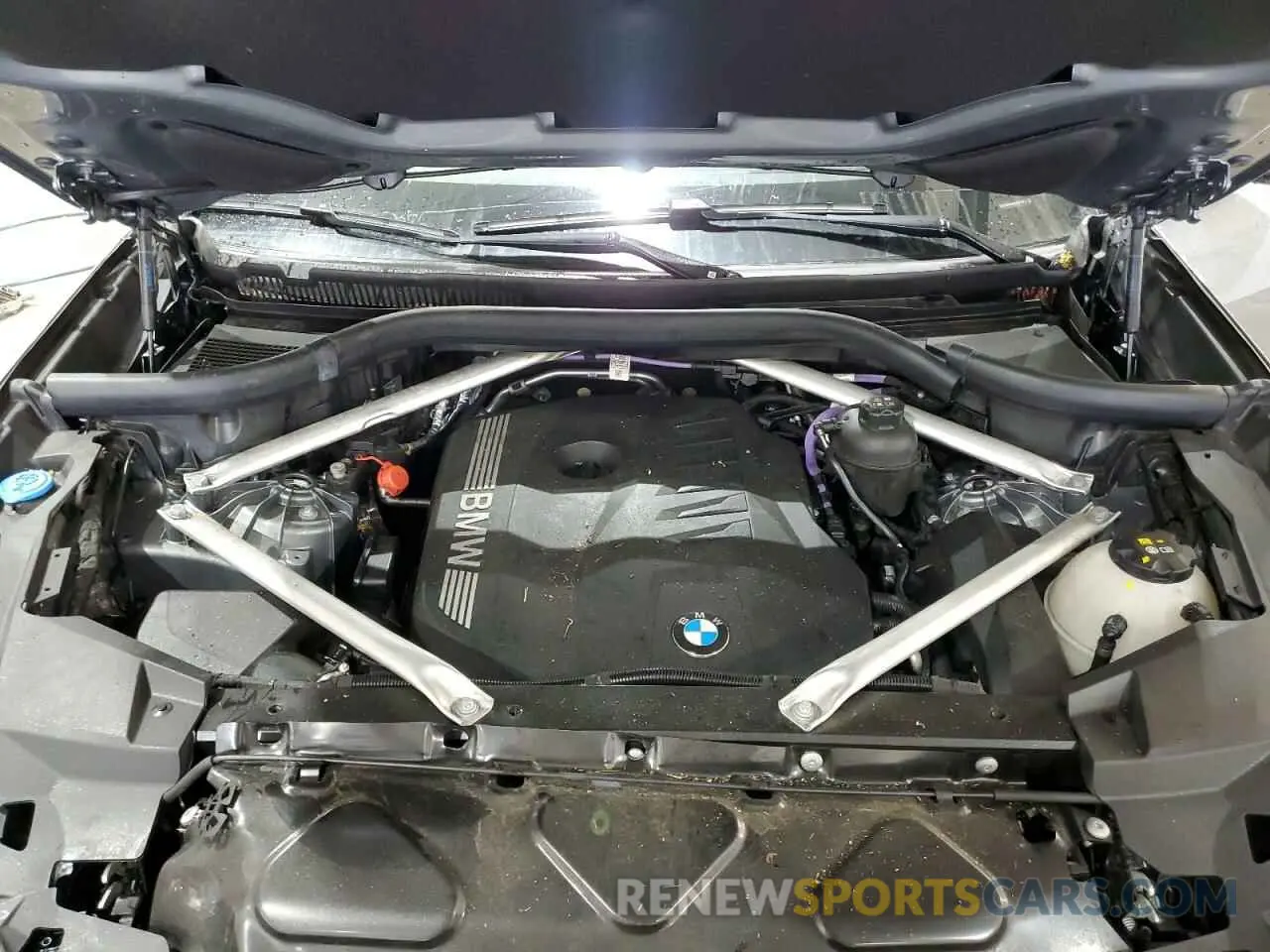 12 Photograph of a damaged car 5UX13EU00R9U94158 BMW X5 2024