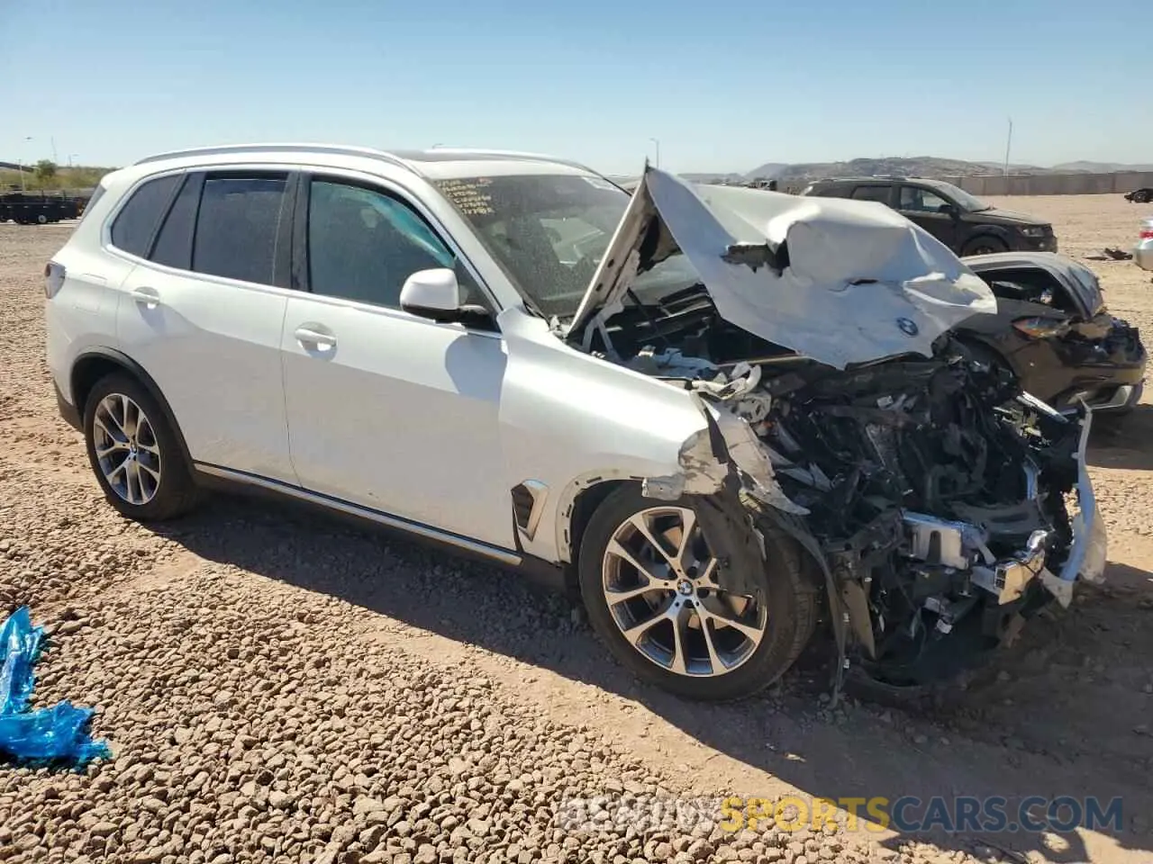 4 Photograph of a damaged car 5UX13EU05R9S40431 BMW X5 2024