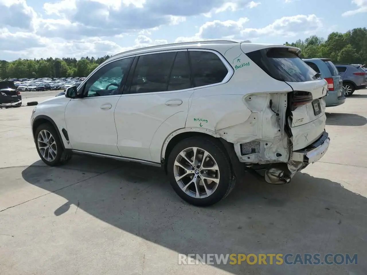 2 Photograph of a damaged car 5UX13EU05R9S49811 BMW X5 2024