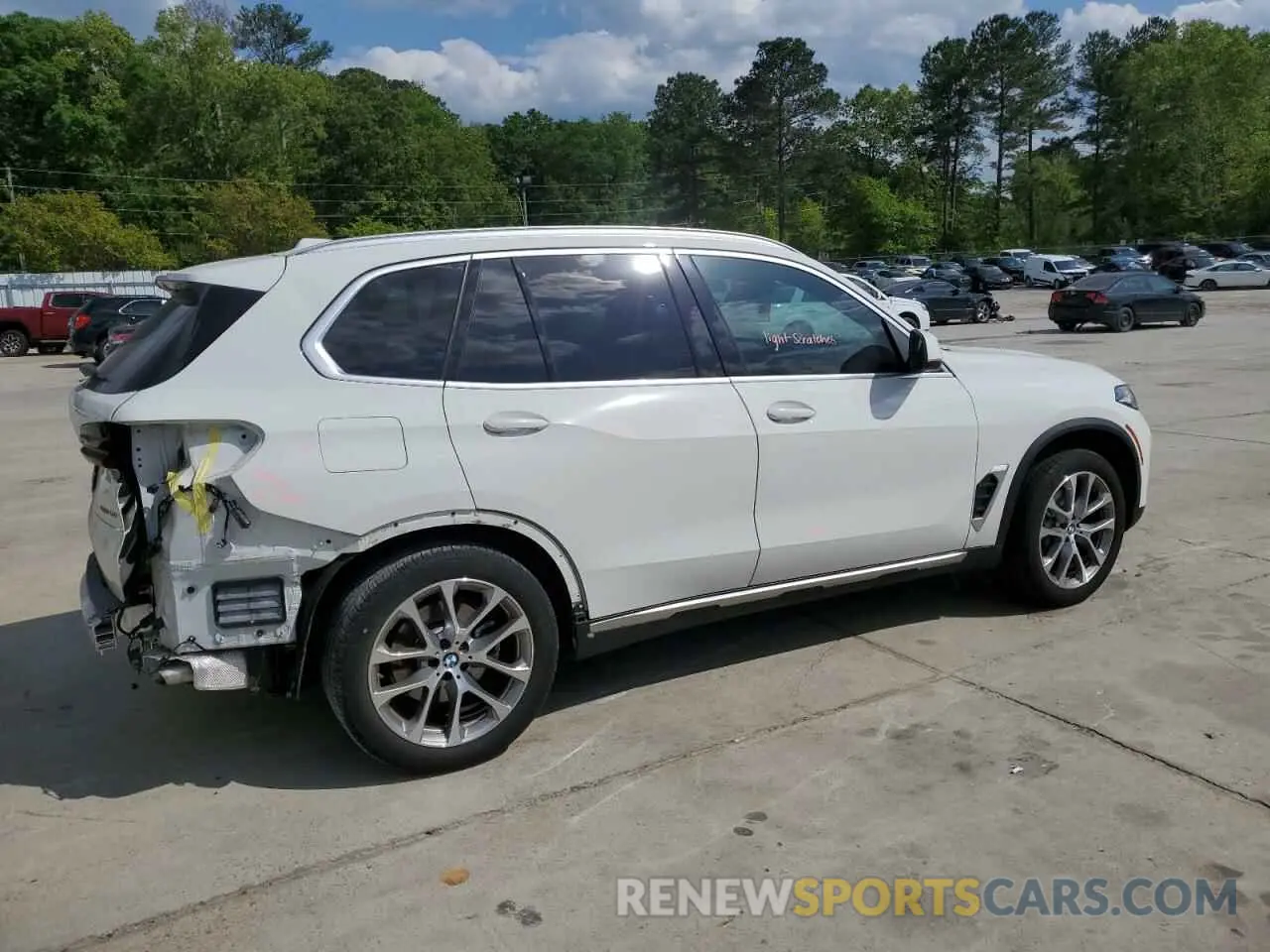 3 Photograph of a damaged car 5UX13EU05R9S49811 BMW X5 2024