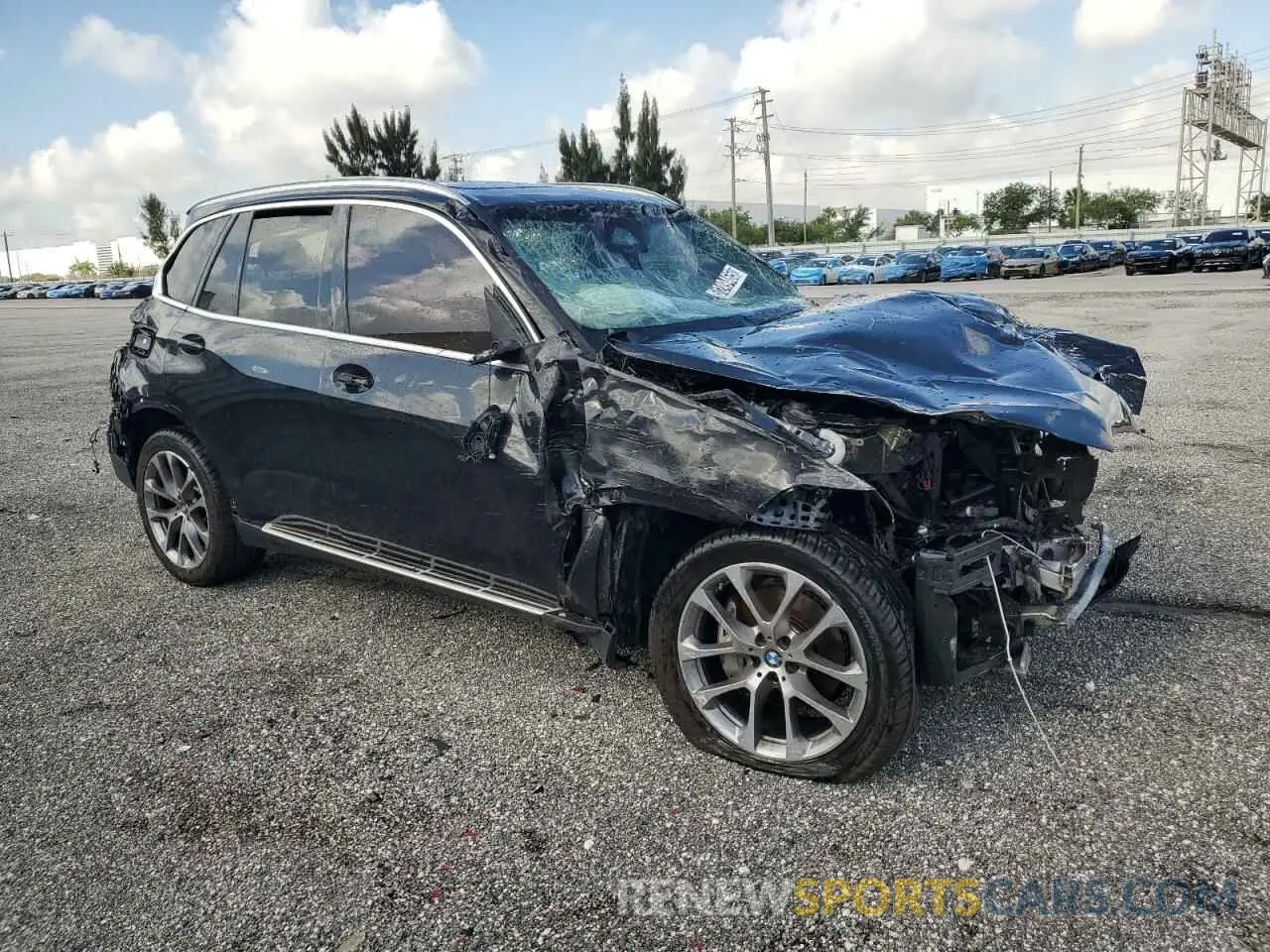 4 Photograph of a damaged car 5UX13EU07R9S14834 BMW X5 2024