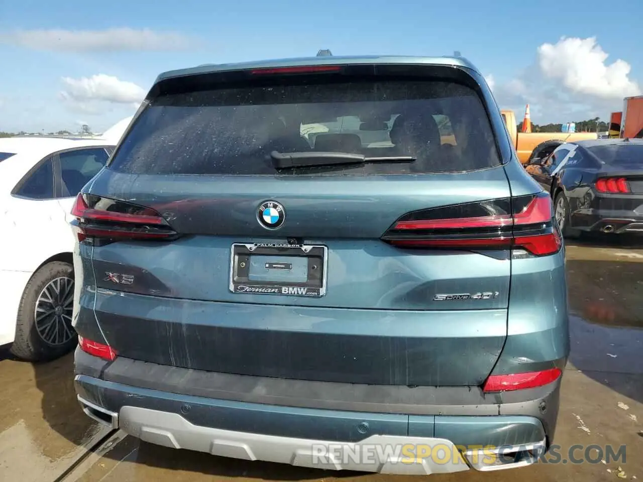6 Photograph of a damaged car 5UX13EU08R9V20974 BMW X5 2024