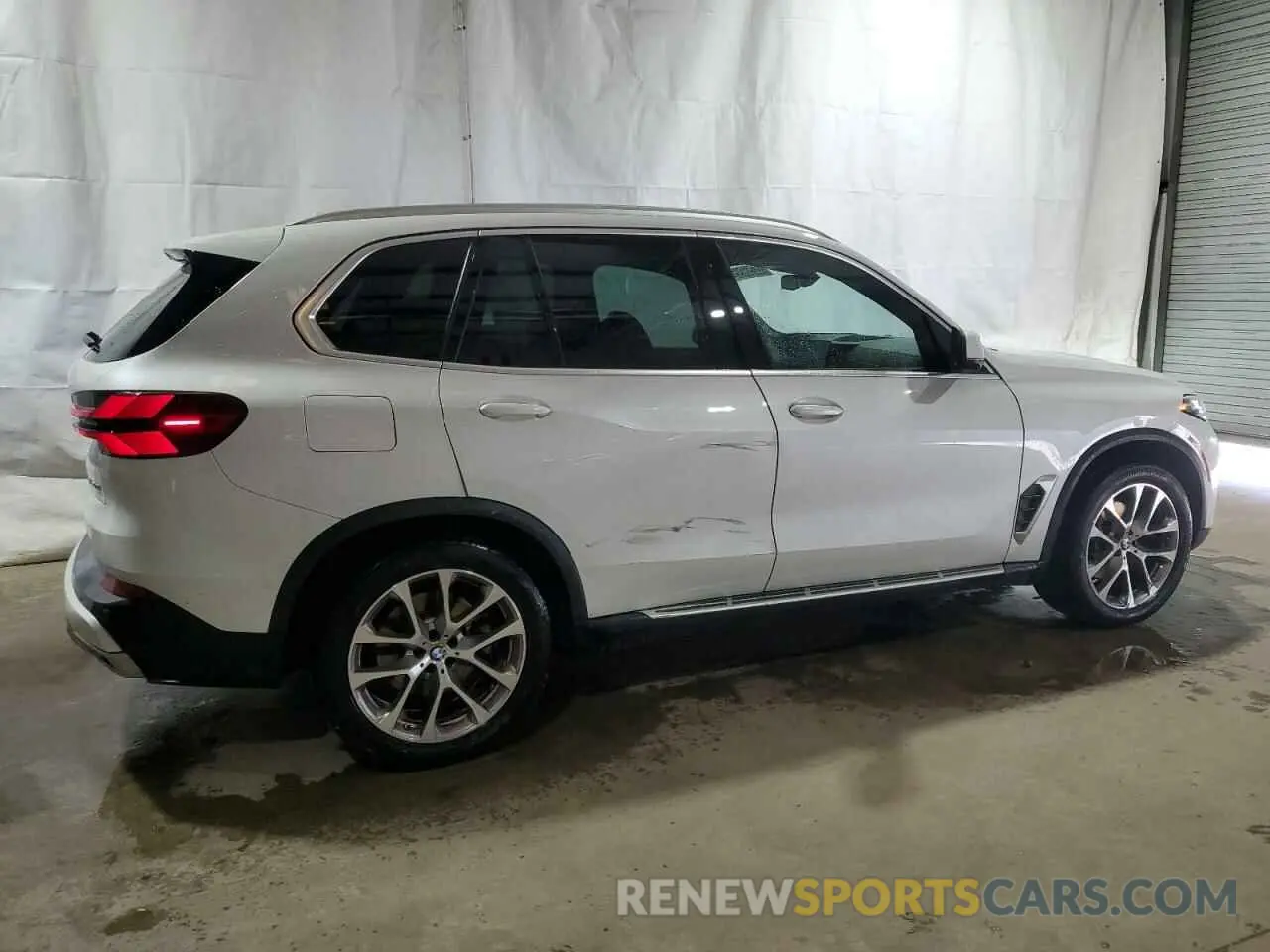 3 Photograph of a damaged car 5UX13EU0XR9U04157 BMW X5 2024