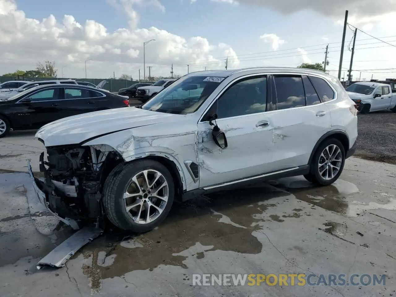 1 Photograph of a damaged car 5UX23EU01R9T65592 BMW X5 2024
