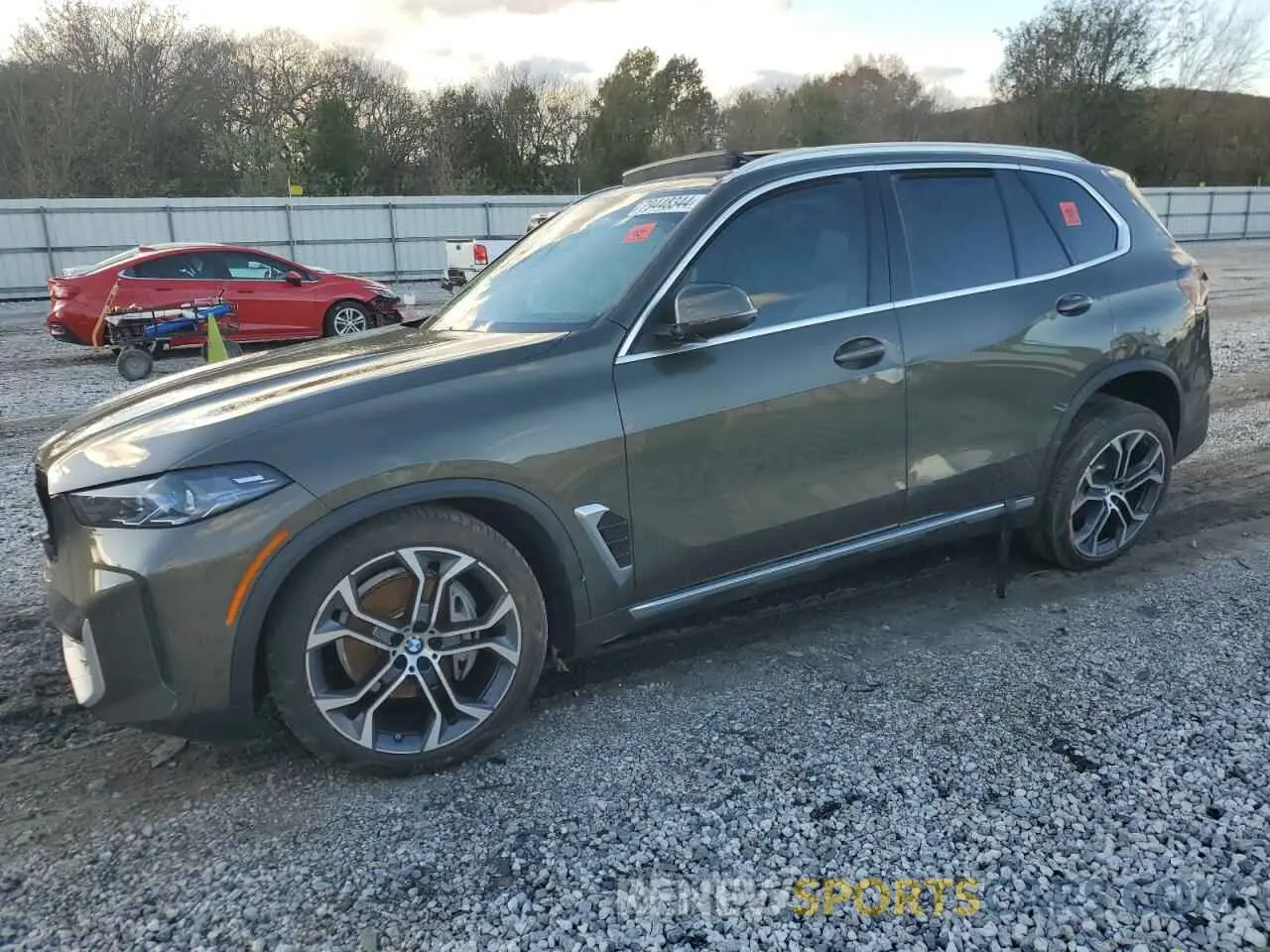1 Photograph of a damaged car 5UX23EU01R9U51288 BMW X5 2024