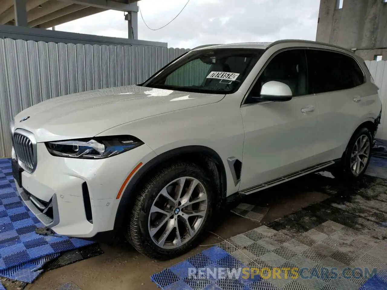1 Photograph of a damaged car 5UX23EU01R9U70259 BMW X5 2024