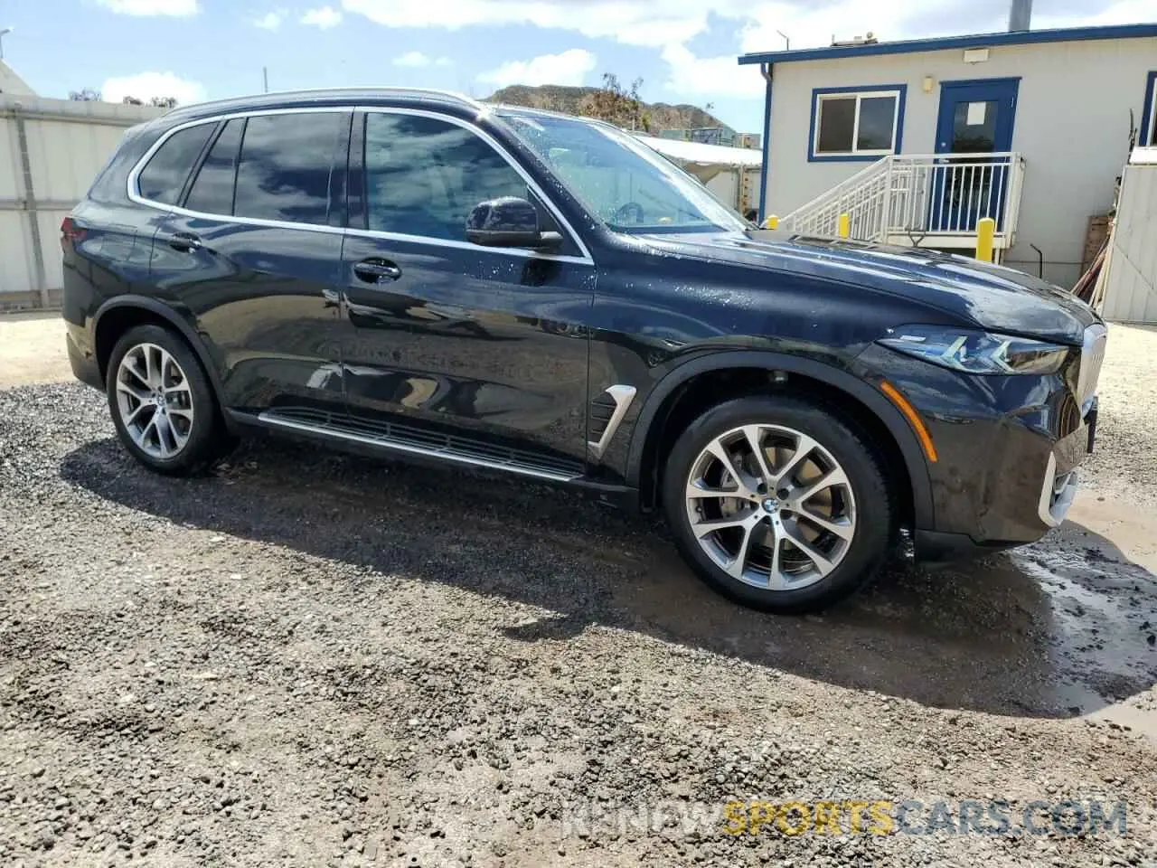 4 Photograph of a damaged car 5UX23EU03R9T70325 BMW X5 2024